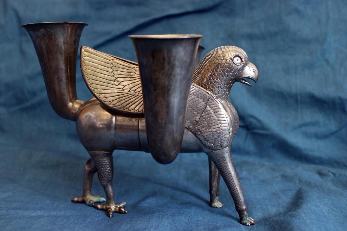US diplomats seized a silver drinking cup, cast in the form of a griffin, during an investigation in 2003. The cup was returned to Iranian authorities, but experts now say it is a fake US Department of State
