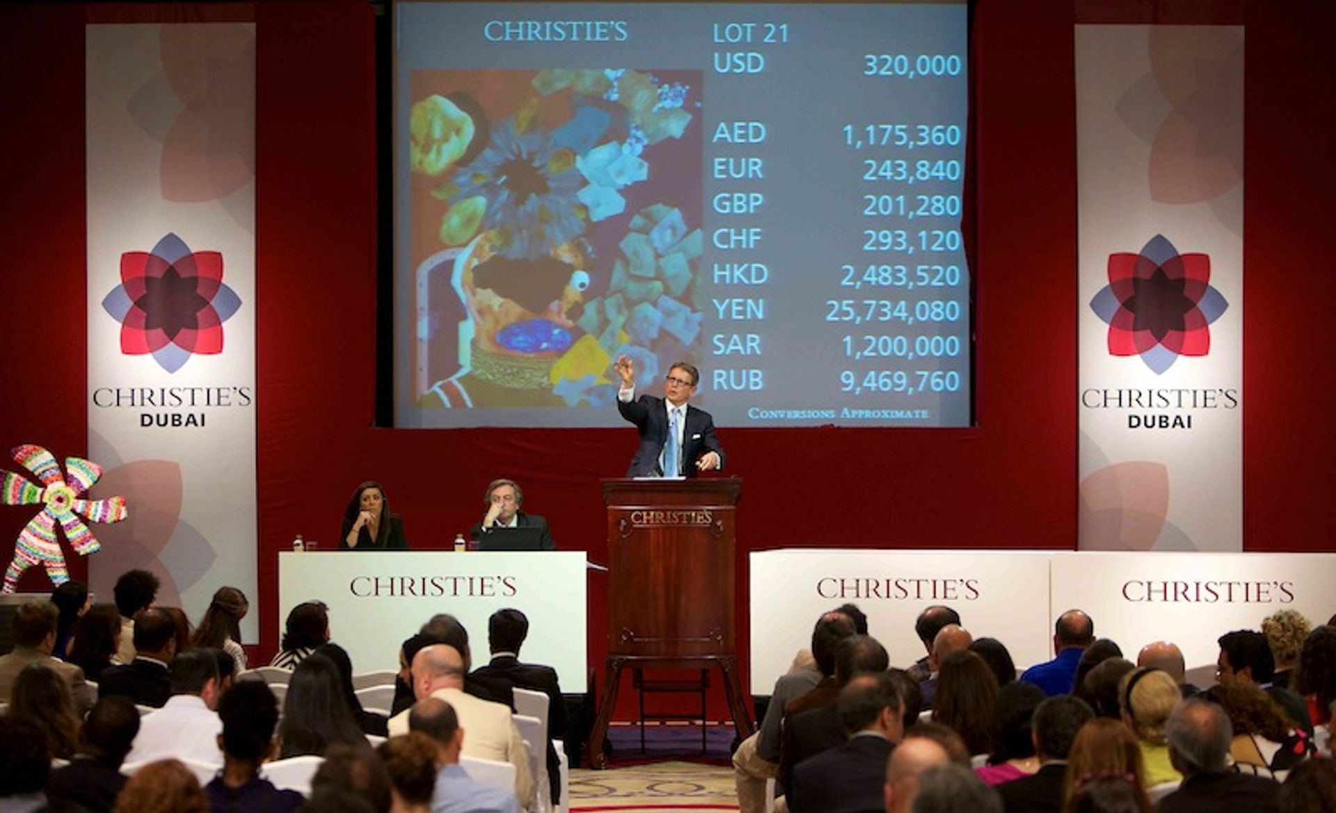 Auctioneer Jussi Pylkkänen on the rostrum at Christie's Dubai sale in 2012 Courtesy of Christie's
