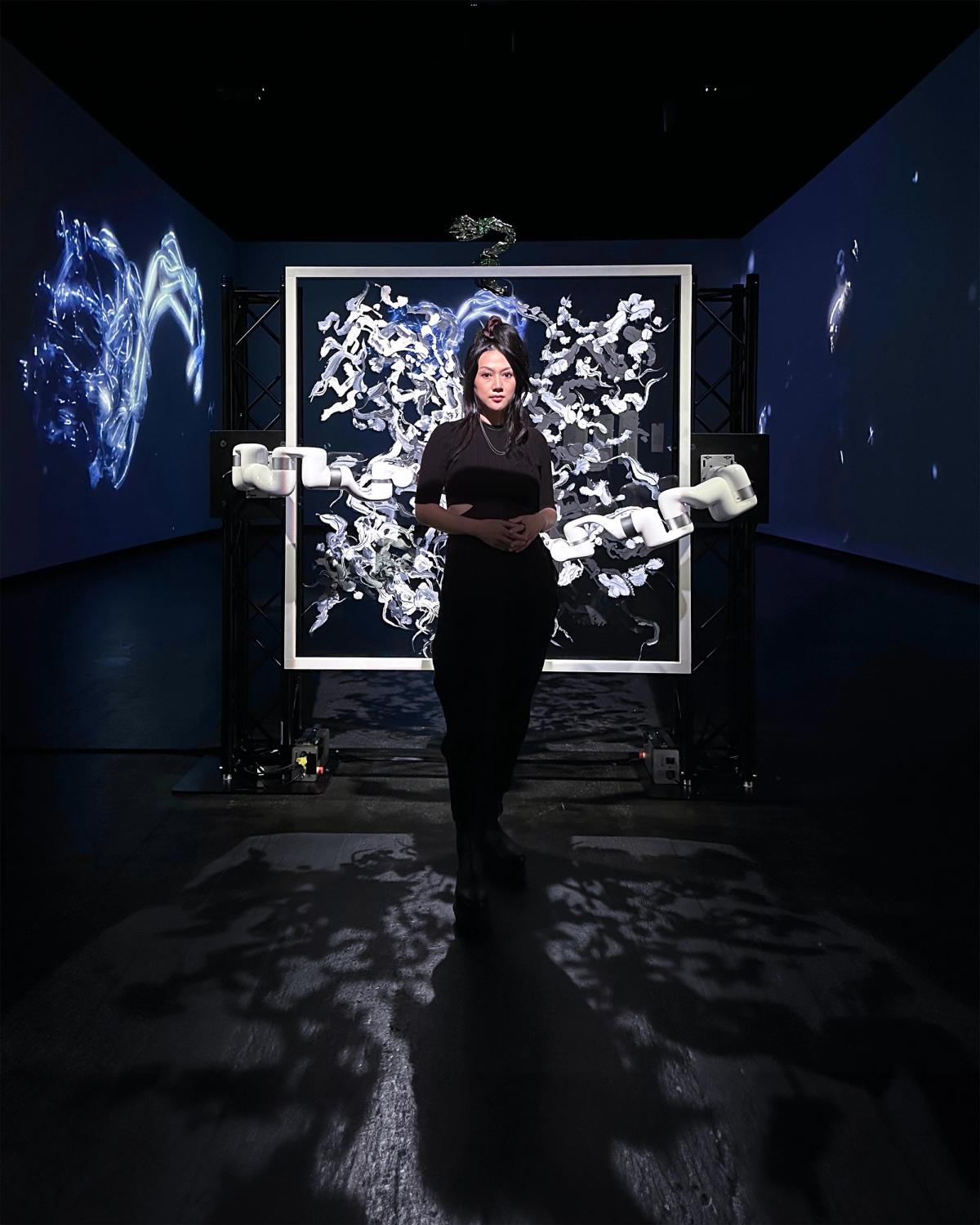 Sougwen Chung with Spectral, in which a robot paints by tapping into the artist’s brainwaves
Courtesy of the artist
