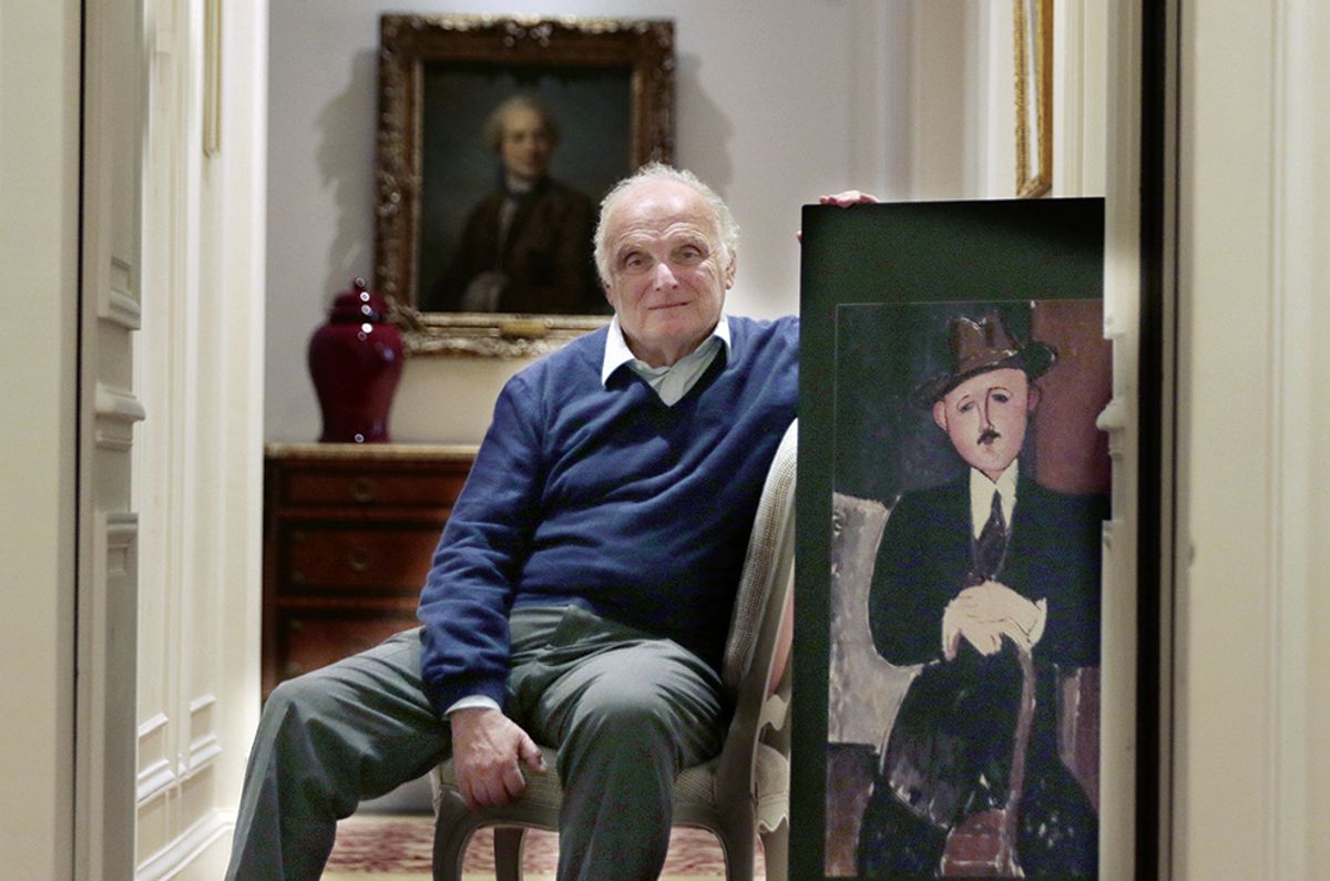 David Nahmad with Amedeo Modigliani’s Seated Man With a Cane (1918) Photo: Julien de Fontenay/JDD/SIPA