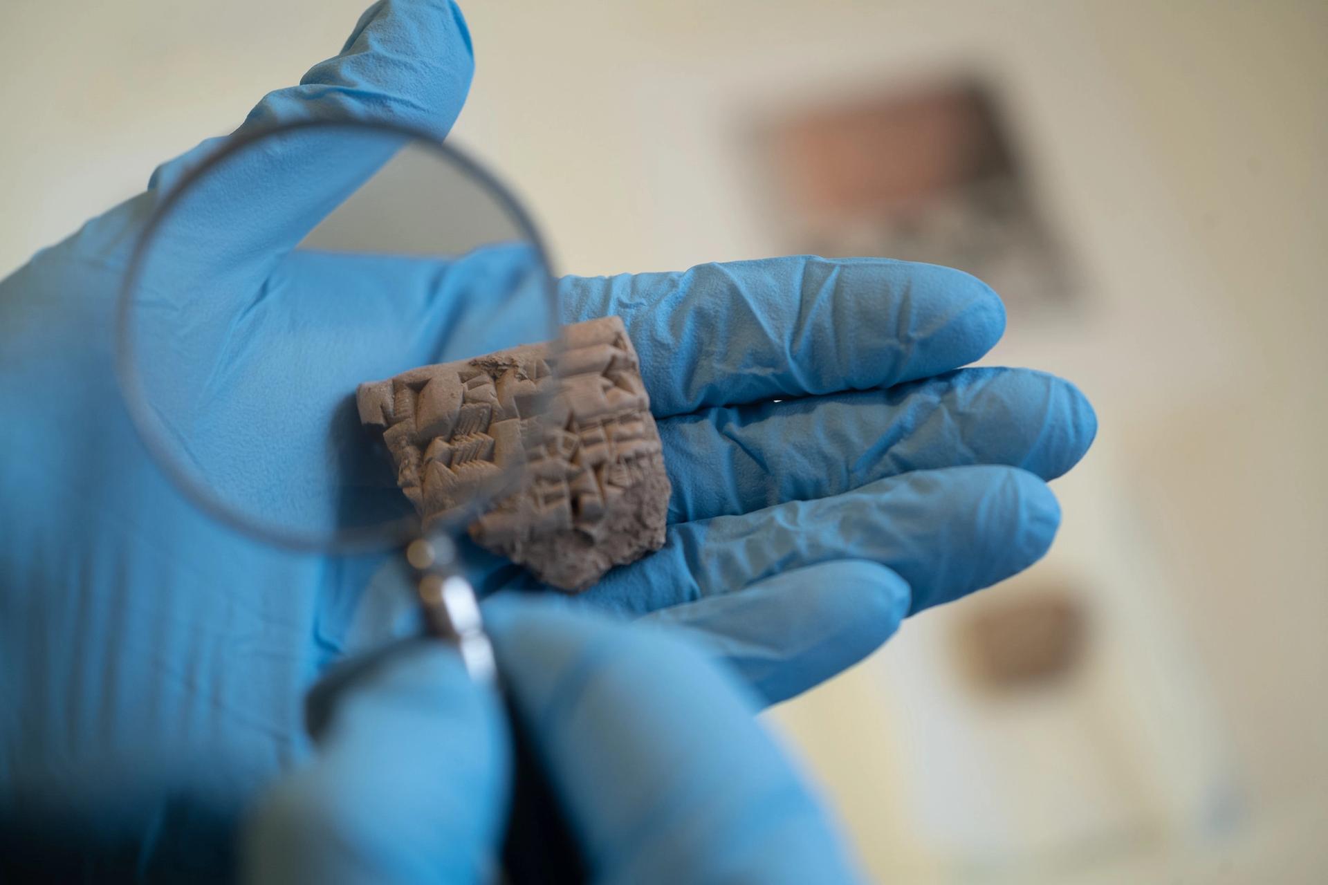 A fragment of a Mesopotamian clay tablet dating from between 2100 and 2000BC Kyle Cassidy