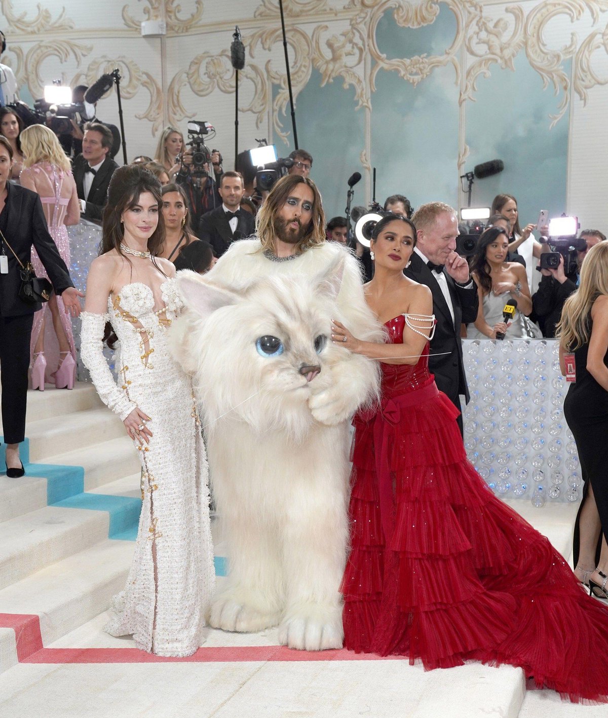 Anne Hathaway (left), Jared Leto (centre) and Selma Hayek (right) arriving at the 2023 Met Gala honouring Karl Lagerfeld Kristin Callahan/Everett Collection Inc/Alamy Stock Photo