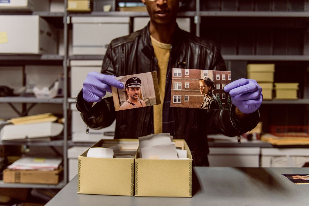 Artist Aay Preston-Myint with the archives of the Leather Archives &
Museum in Chicago, Illinois Photo by Ryan Edmund Thiel for Sixty Inches From Center, 2018