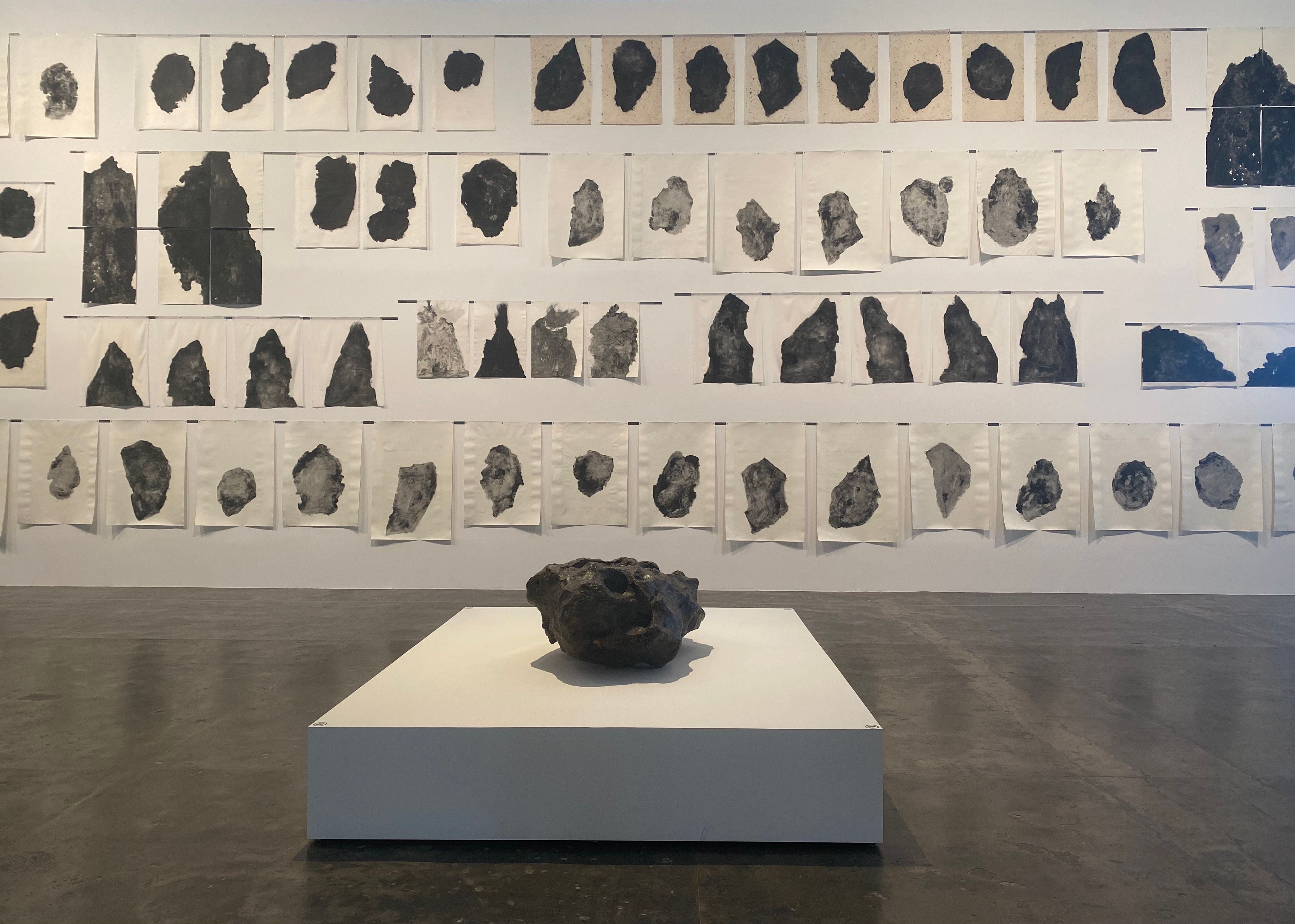 Santa Luzia Meteorite (found 1921 in Goiás, Brazil) in the collection of the Museu Nacional / Universidade Federal do Rio de Janeiro, with Boca do Inferno (2020) by Carmela Gross Photo: Gabriella Angeleti