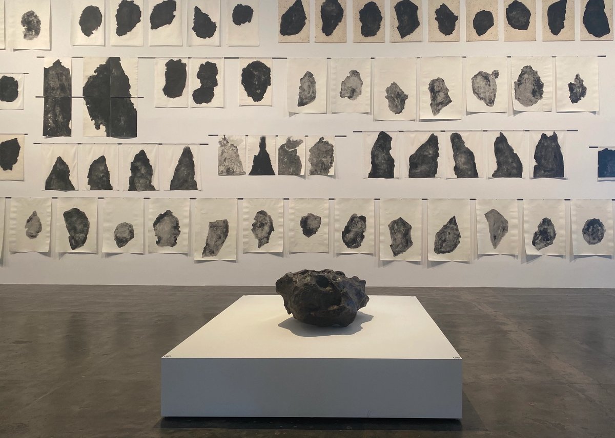 Santa Luzia Meteorite (found 1921 in Goiás, Brazil) in the collection of the Museu Nacional / Universidade Federal do Rio de Janeiro, with Boca do Inferno (2020) by Carmela Gross Photo: Gabriella Angeleti