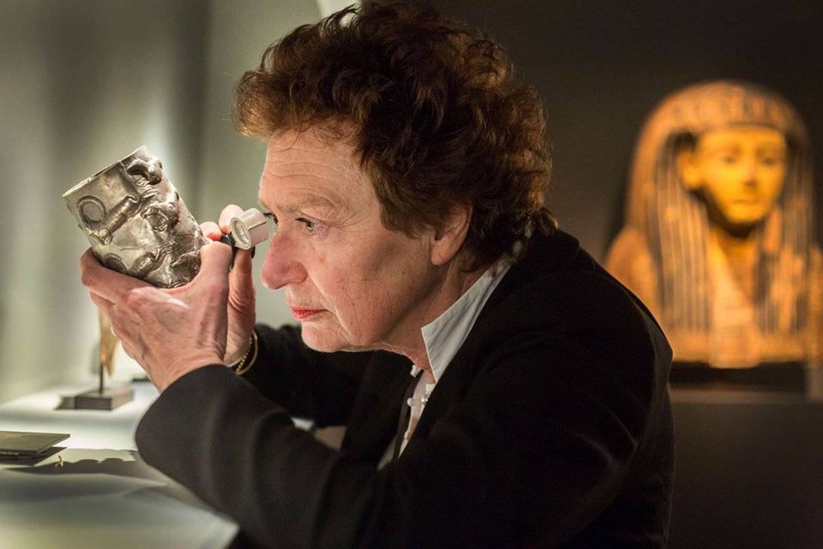 A vetter at Tefaf Maastricht fair examines an antiquity to check its authenticity Photo: Loraine Bodewes