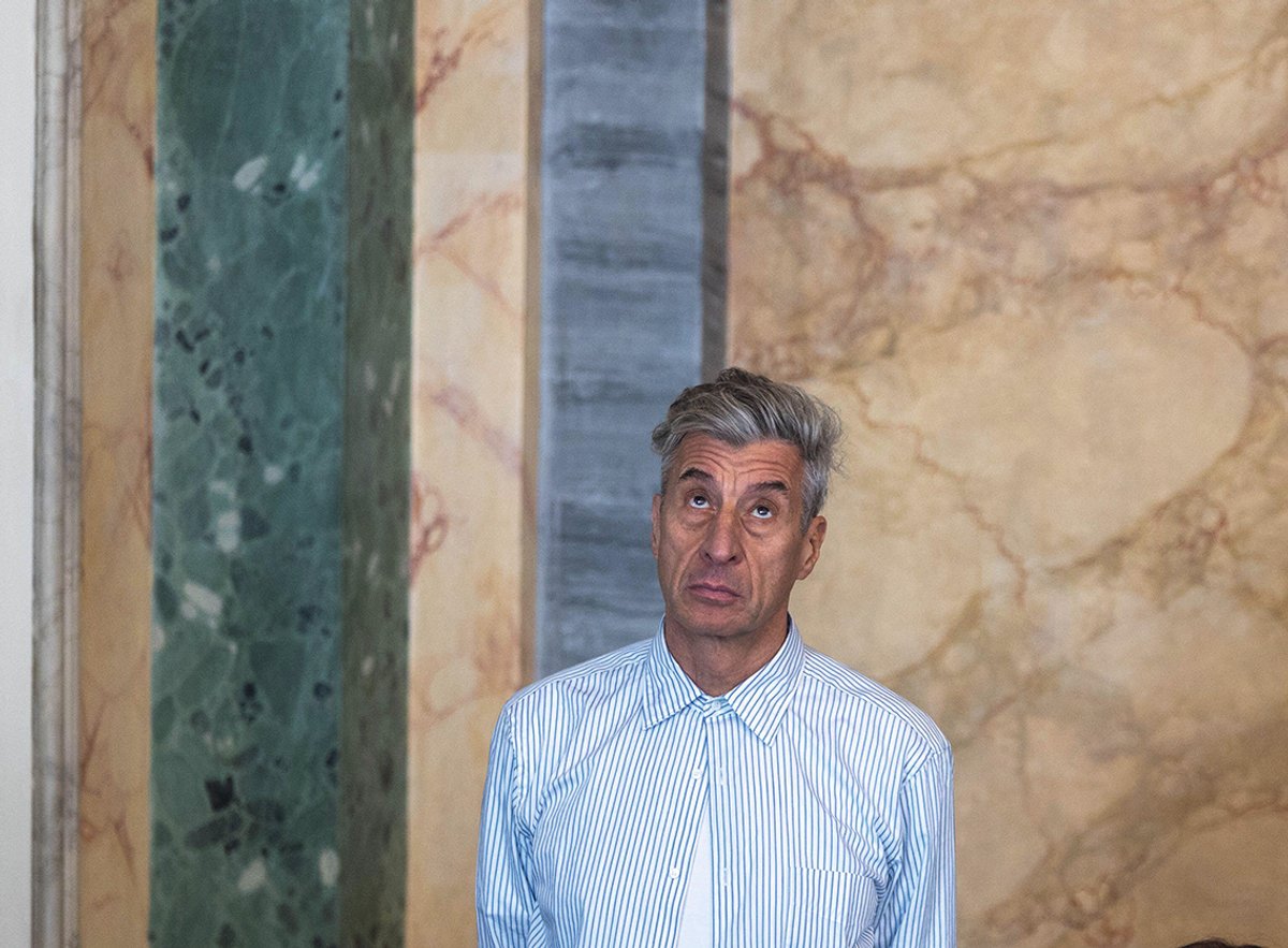 Maurizio Cattelan possibly having some deep thoughts LaPresse/Alamy Stock Photo