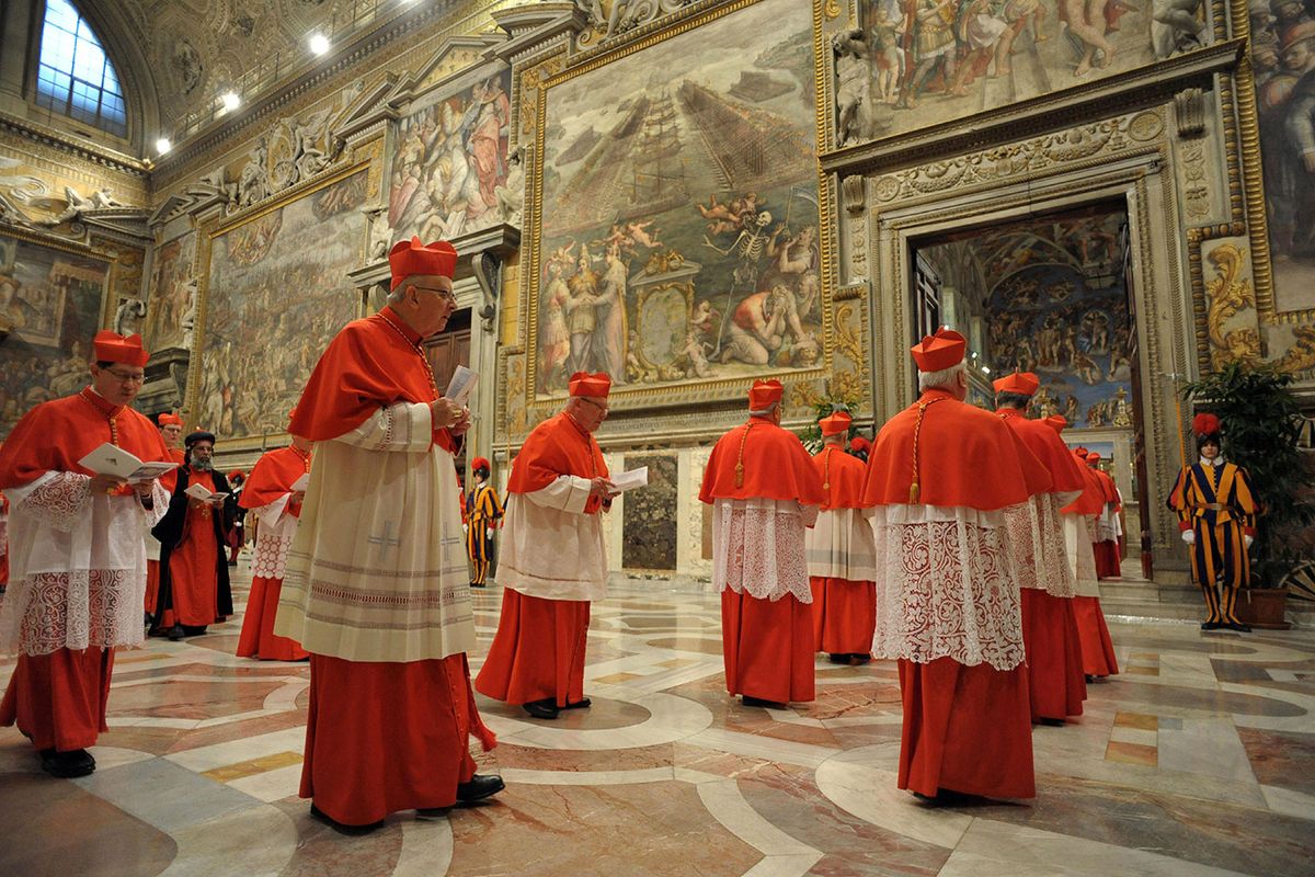 Cardinals of the Catholic Church process from the Cappella Paolina and through the Sala Regia before turning left into the Sistine Chapel during the March 2013 conclave that elected the late Pope Francis. With Giorgio Vasari's wall painting of the Battle of Lepanto at centre Abaca Press / Alamy Stock Photo