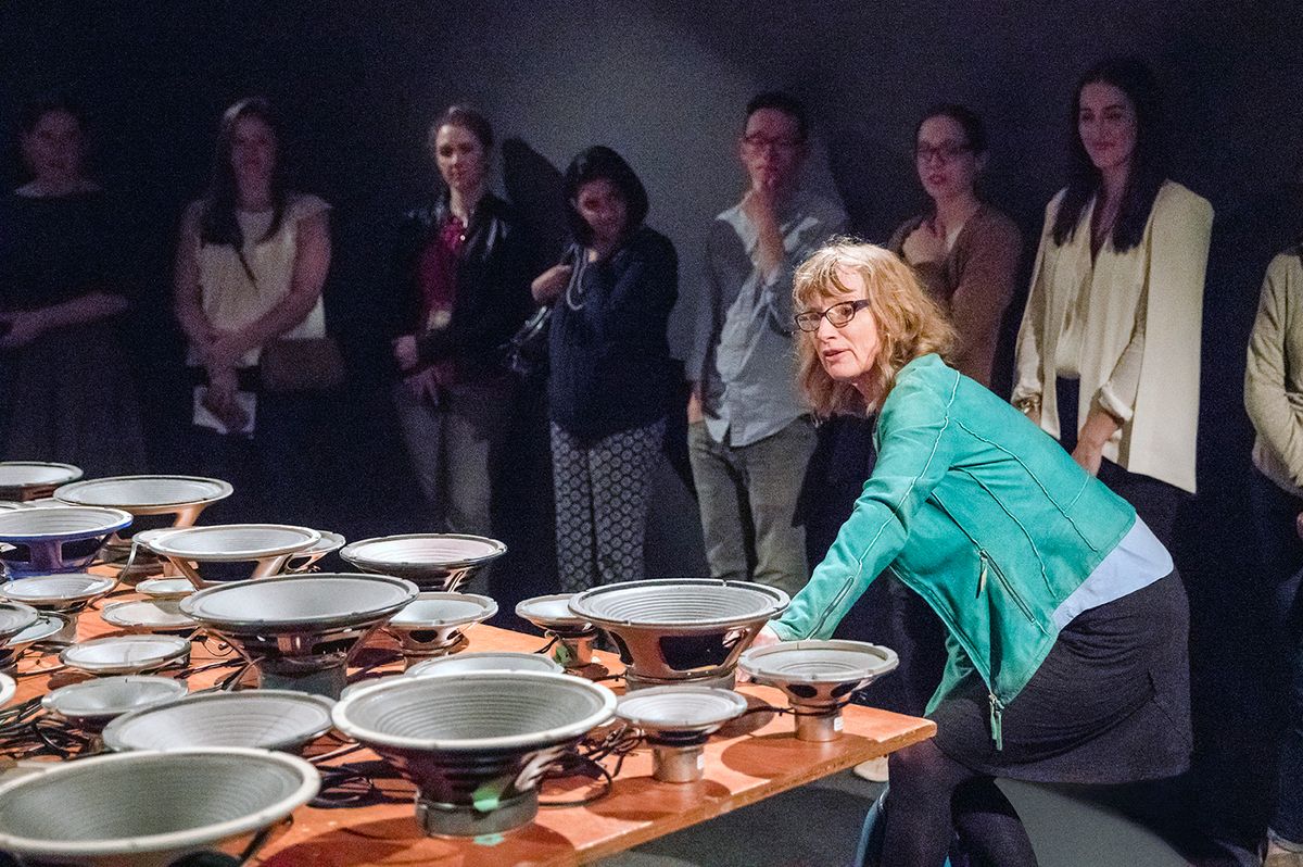 Janet Cardiff demonstrates how to "play" Experiment in F# Minor (2013) at the Scad Museum of Art ©2018 Savannah College of Art and Design