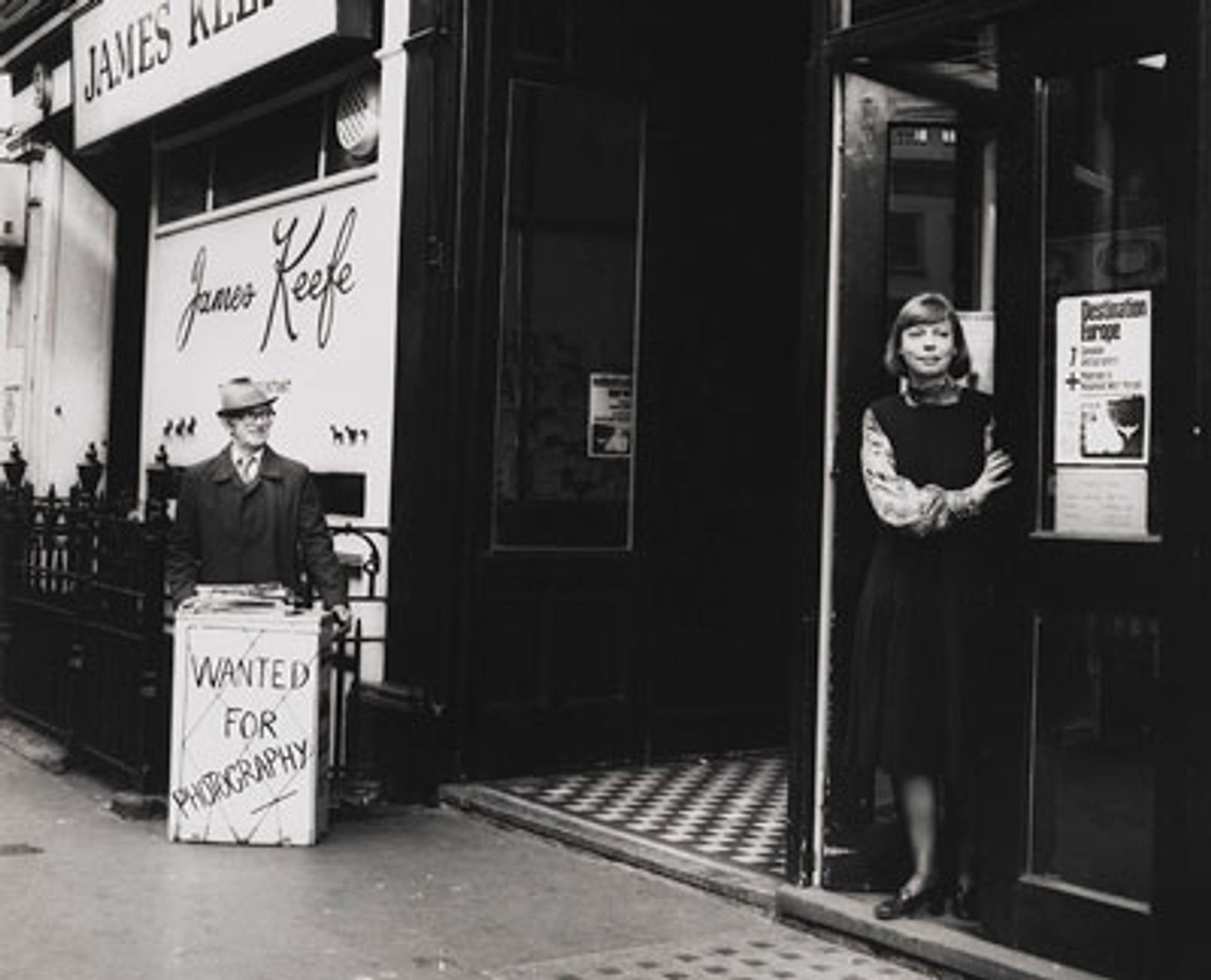 Sue Davies, the founder of the Photographers' Gallery standing at its entrance on Great Newport Street, between Leicester Square and Covent Garden