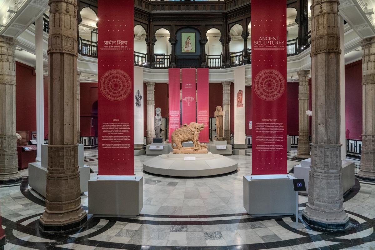 Yajna Varaha, the incarnation of Vishnu as a boar, sandstone, 900–1099 CE. Found in the river at Vidisha in Madhya Pradesh, India. Vidisha District Archaeological Museum, State Department of Archaeology Archives and Museums. Right: Venus, goddess of love and passion, marble, Roman (around 150 CE). Antikensammlung, Staatliche Museen zu Berlin. Left: Bacchus, god of intoxication, abundance and rebirth, marble, Roman (100–199 CE). Found in Cyrene, Libya, British Museum. Photo: Anna Somers Cocks