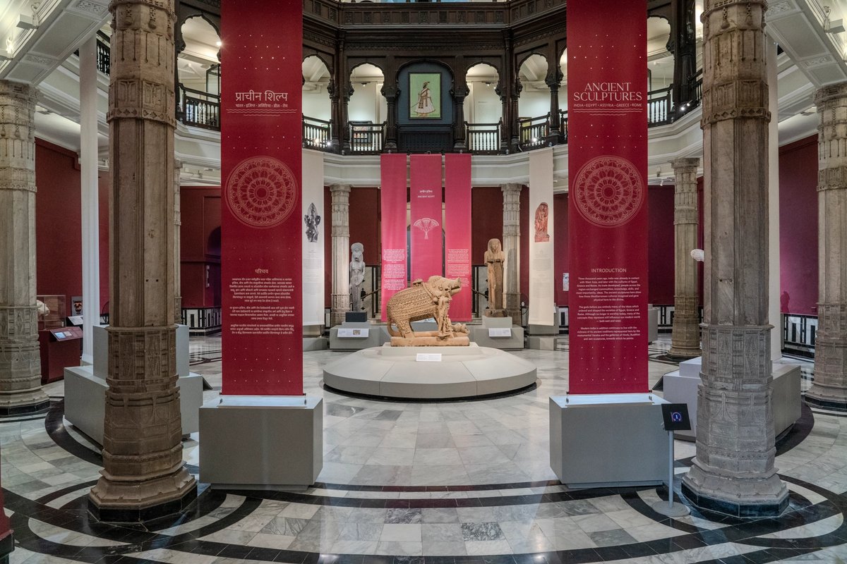 Yajna Varaha, the incarnation of Vishnu as a boar, sandstone, 900–1099 CE. Found in the river at Vidisha in Madhya Pradesh, India. Vidisha District Archaeological Museum, State Department of Archaeology Archives and Museums. Right: Venus, goddess of love and passion, marble, Roman (around 150 CE). Antikensammlung, Staatliche Museen zu Berlin. Left: Bacchus, god of intoxication, abundance and rebirth, marble, Roman (100–199 CE). Found in Cyrene, Libya, British Museum. Photo: Anna Somers Cocks