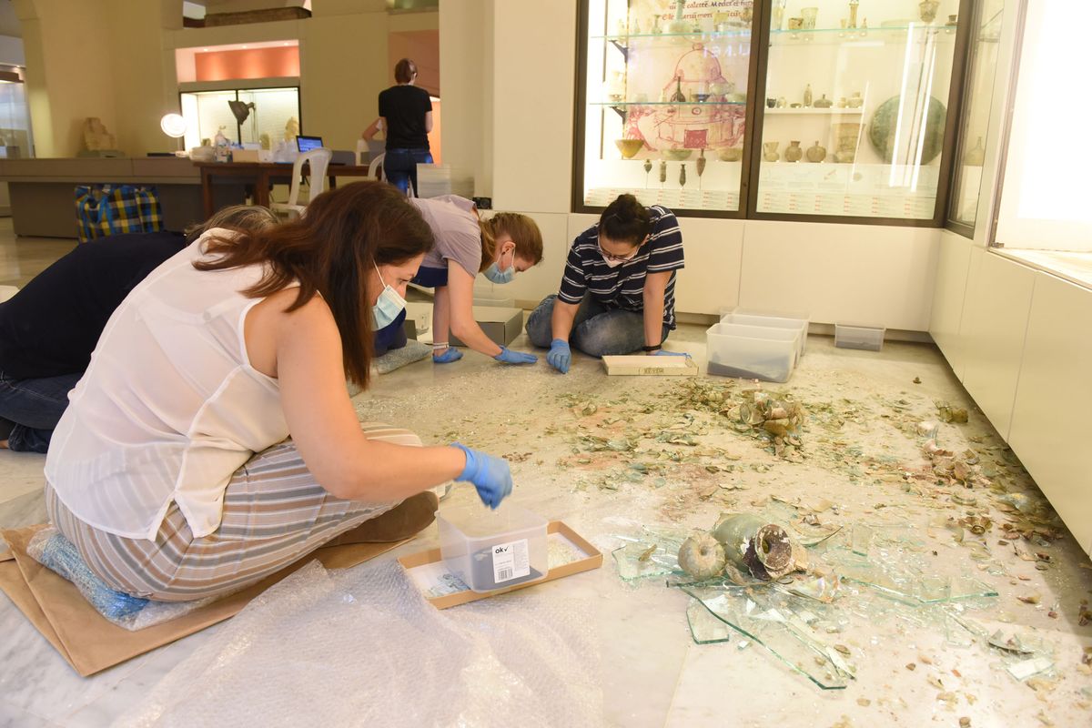 Staff from the Archaeological Museum at the American University of Beirut retrieved fragments of broken glass vessels from the debris of the explosion in August 2020 Courtesy of the AUB Office of Communications and Archaeological Museum