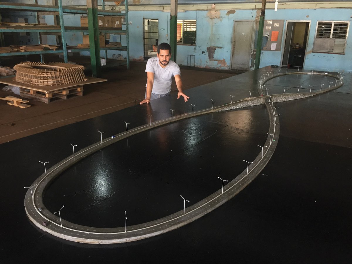 Wilfreo Prieto with his model of Viaje Infinito, which when complete will cover 490 acres Courtesy of Wilfredo Prieto