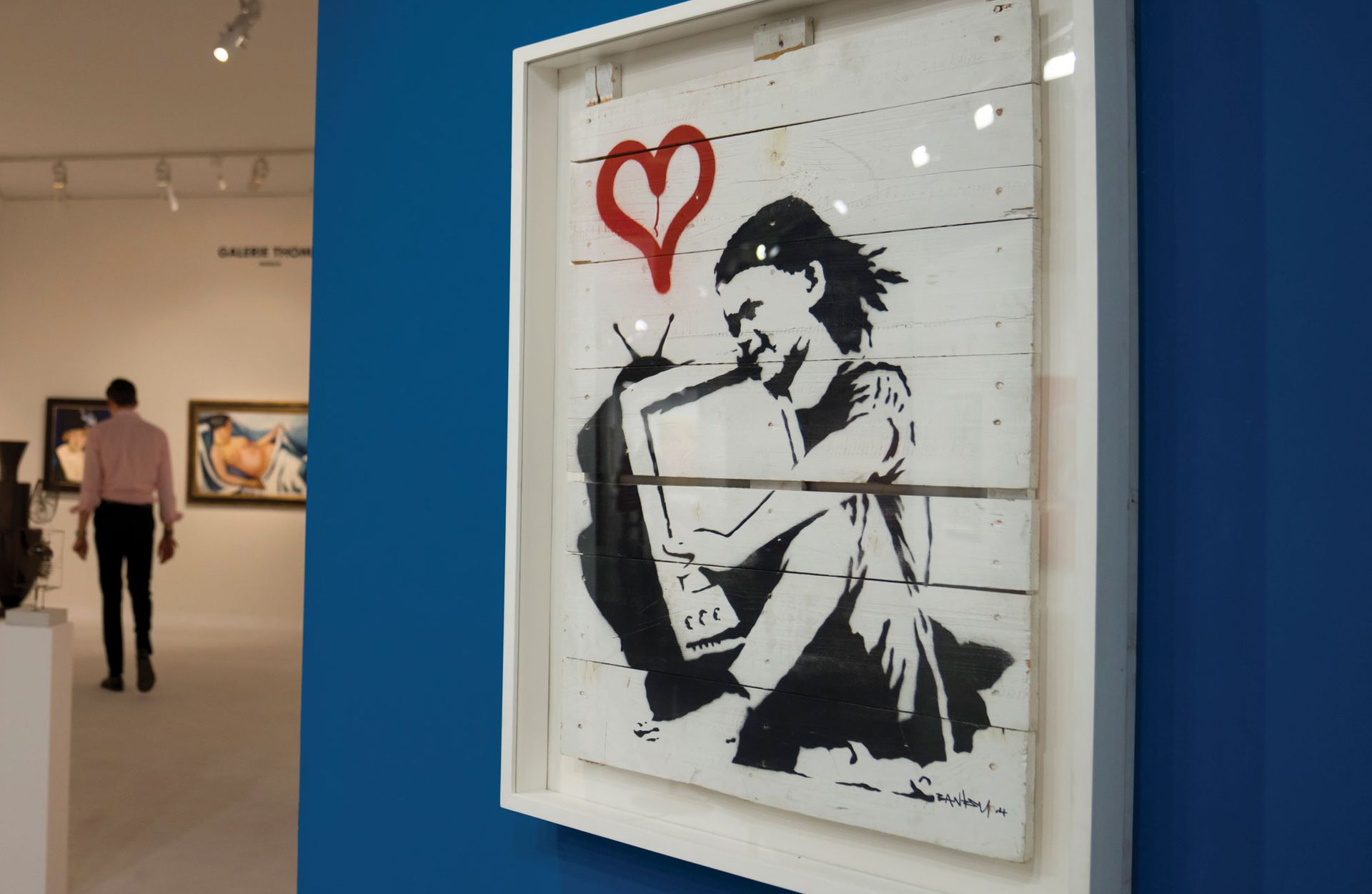 Banksy’s Girl with TV and Red Heart (2004) has a price tag of $3.85m at Galerie Thomas Photo: Eric Thayer