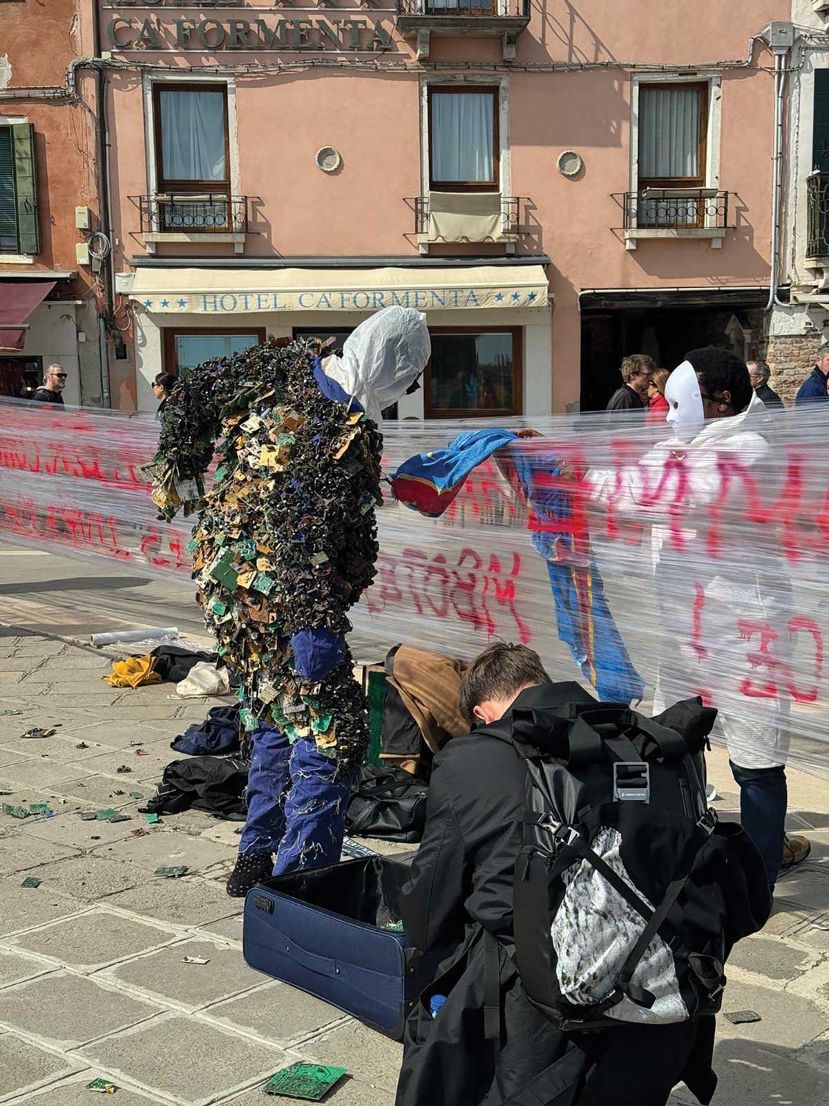 The artist Eddy Ekete stages an impromptu performance outside the Giardini, after the DRC’s pavilion was cancelled at the last minute
© Eddy Ekete