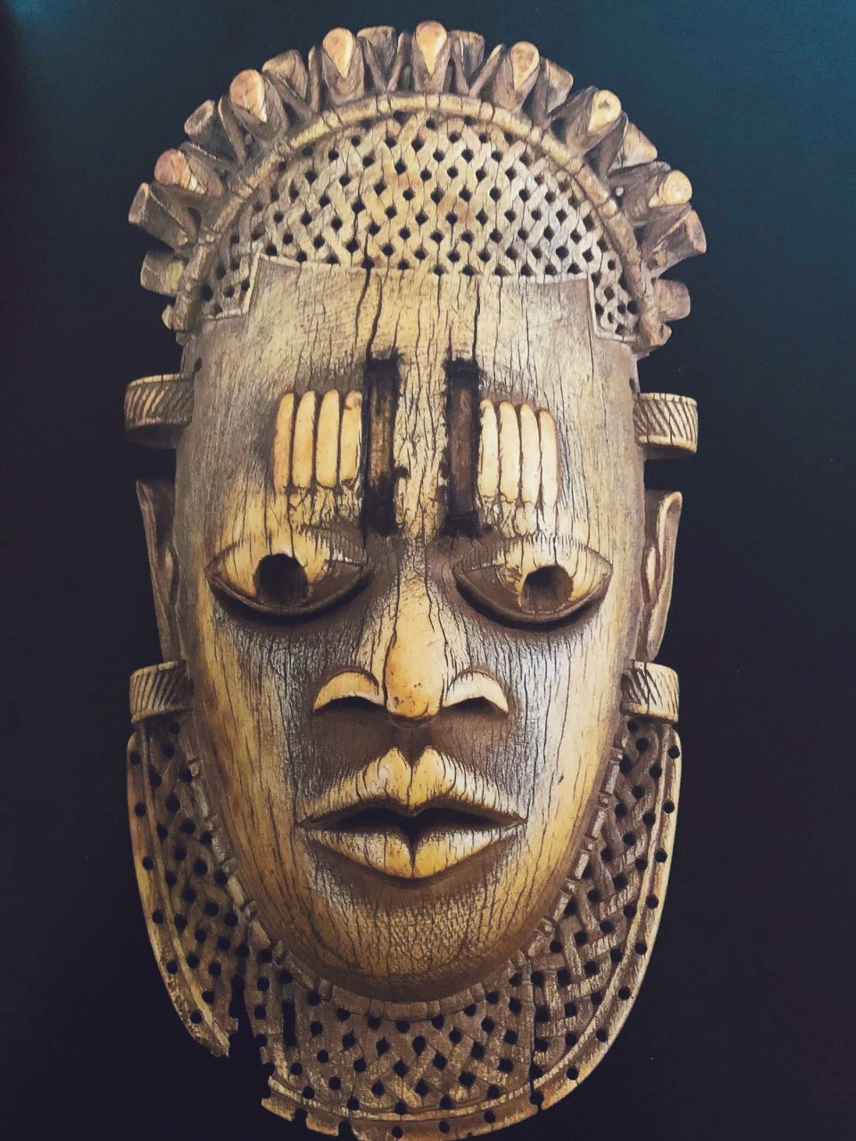 This rare ivory mask, now in the Al-Thani collection in Paris, is one of five similar ivory hip pendants produced for the ceremonial use of the Oba, the ruler of the Edo people. It is thought to represent Idia, mother of Oba Esigie, who ruled in the 16th century. All five known ivory masks were found together in the Oba’s bedchamber by the British when they sacked Benin City in 1897

Courtesy of Sotheby's