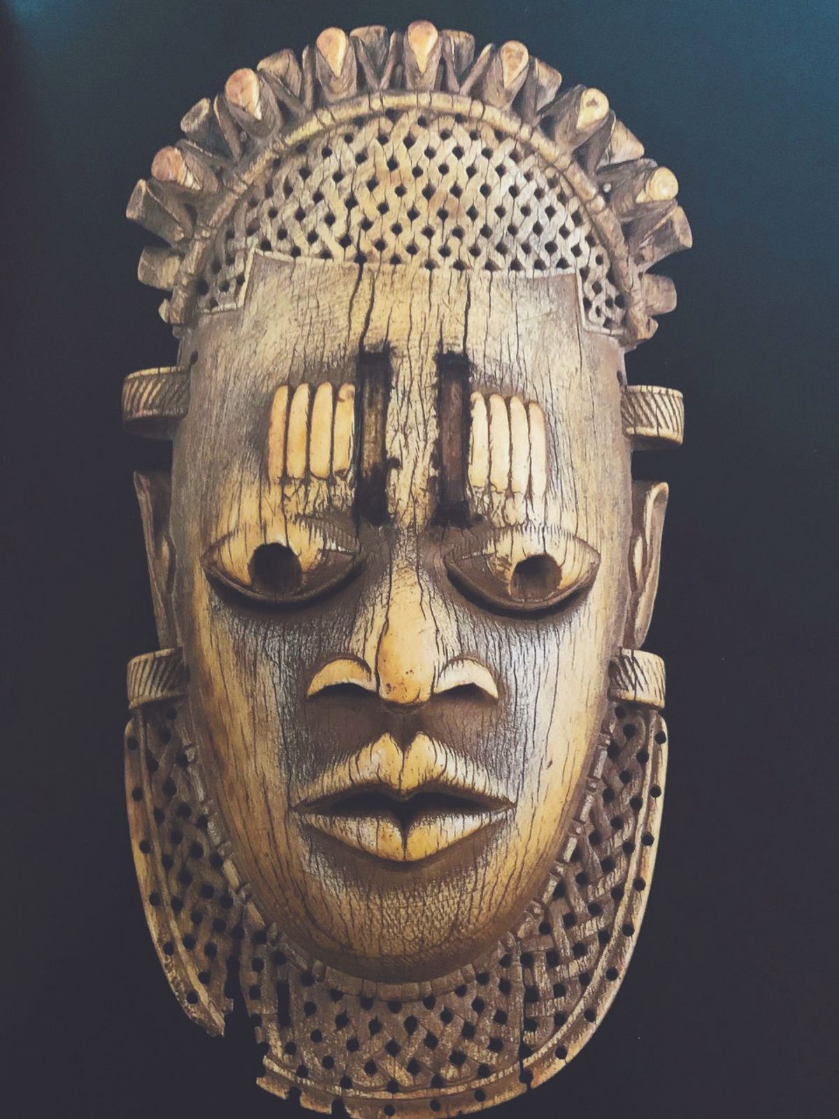 This rare ivory mask, now in the Al-Thani collection in Paris, is one of five similar ivory hip pendants produced for the ceremonial use of the Oba, the ruler of the Edo people. It is thought to represent Idia, mother of Oba Esigie, who ruled in the 16th century. All five known ivory masks were found together in the Oba’s bedchamber by the British when they sacked Benin City in 1897
Courtesy of Sotheby's