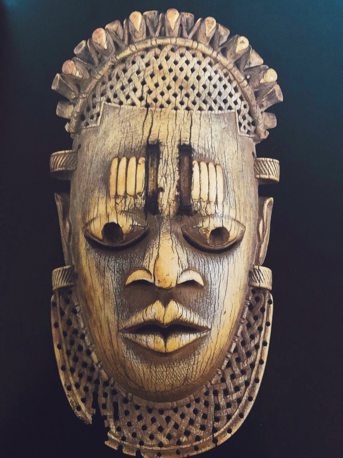 This rare ivory mask, now in the Al-Thani collection in Paris, is one of five similar ivory hip pendants produced for the ceremonial use of the Oba, the ruler of the Edo people. It is thought to represent Idia, mother of Oba Esigie, who ruled in the 16th century. All five known ivory masks were found together in the Oba’s bedchamber by the British when they sacked Benin City in 1897
Courtesy of Sotheby's