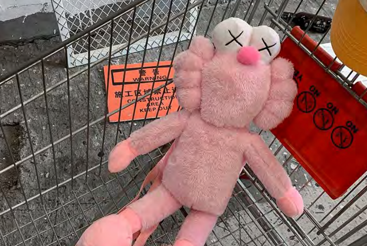 This KAWS-inspired backpack was listed as for sale on the defendant's website. Court documents