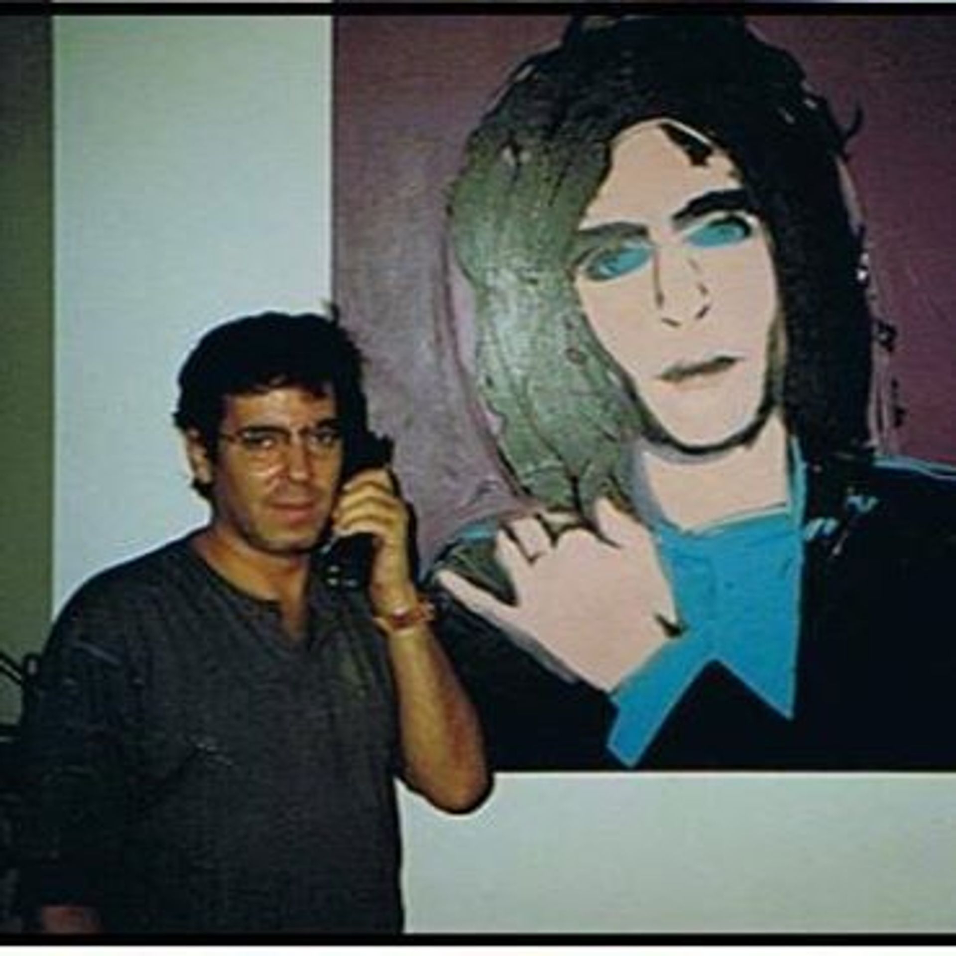 Todd Brassner with a portrait of him by his friend Andy Warhol Via Facebook