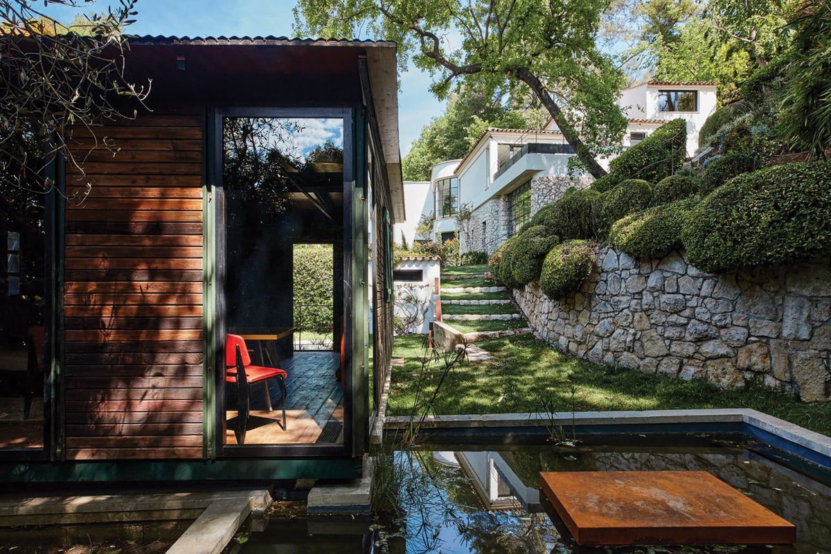 A demountable house designed by the architect Jean Prouvé in 1944 provides one of five guest suites at Fondation CAB, which are all fitted out with pieces from Hubert Bonnet’s collection of 20th-century design © Antoine Lippens/Fondation CAB