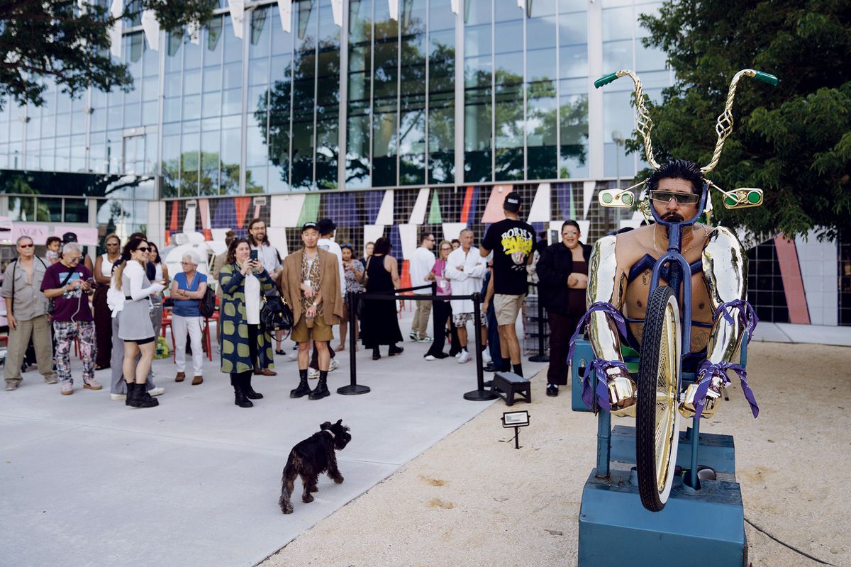 Get in gear: game fair-goers were encouraged to take a “ride” on rafa esparza’s cyborg sculpture Photo: Eric Thayer