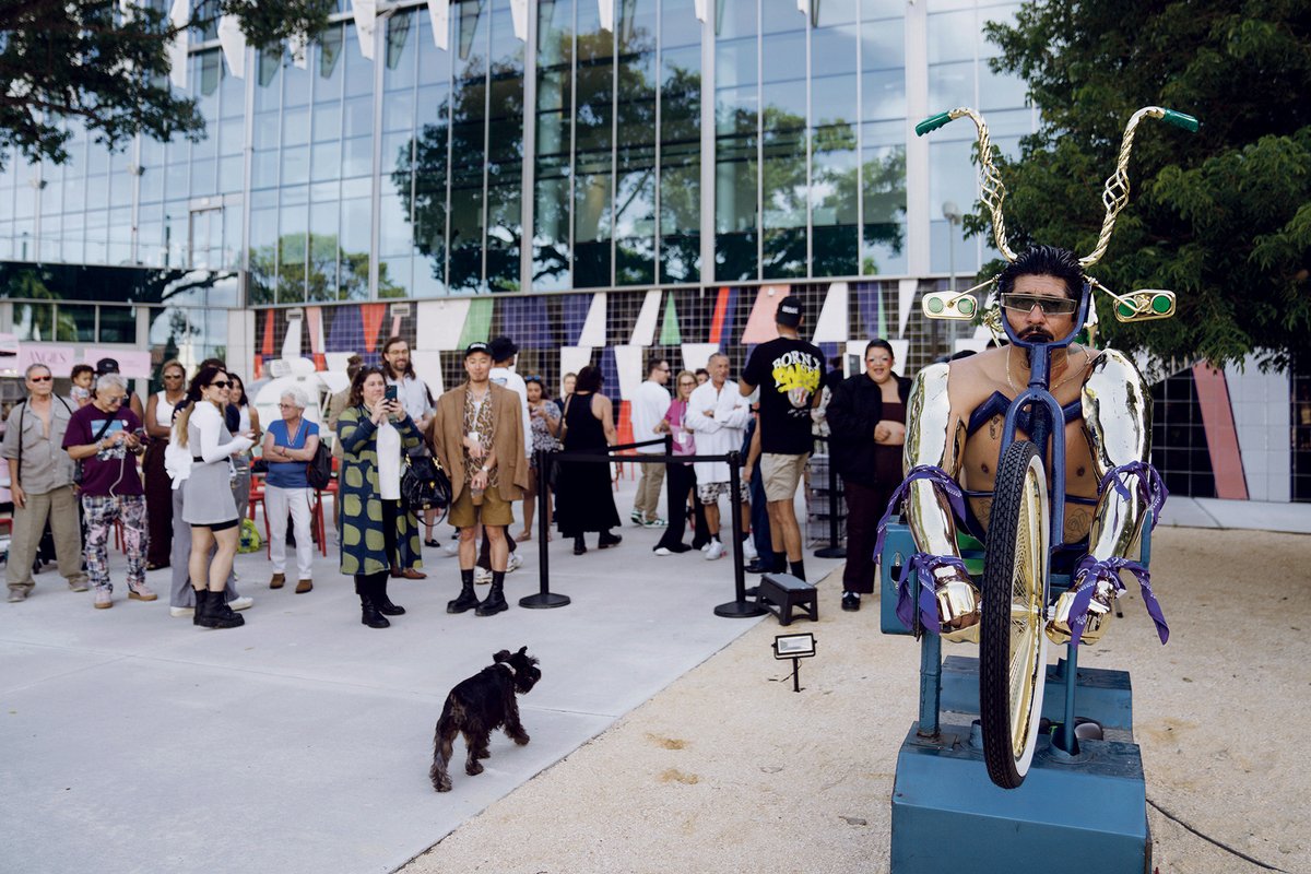 Get in gear: game fair-goers were encouraged to take a “ride” on rafa esparza’s cyborg sculpture Photo: Eric Thayer