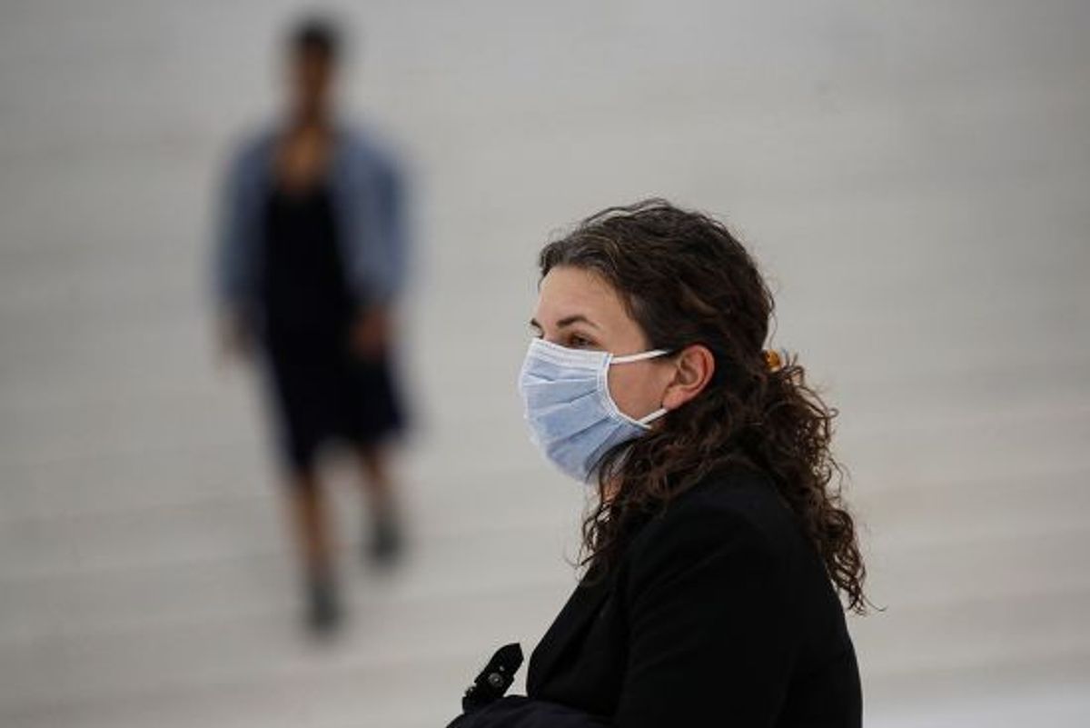 Face masks are in short supply across the globe. John Minchillo/AP/Shutterstock
