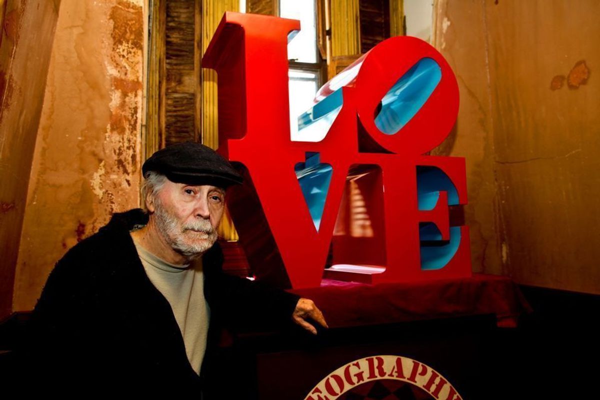 The artist Robert Indiana with one of his best-known images in Vinalhaven, Maine © Joel Greenberg