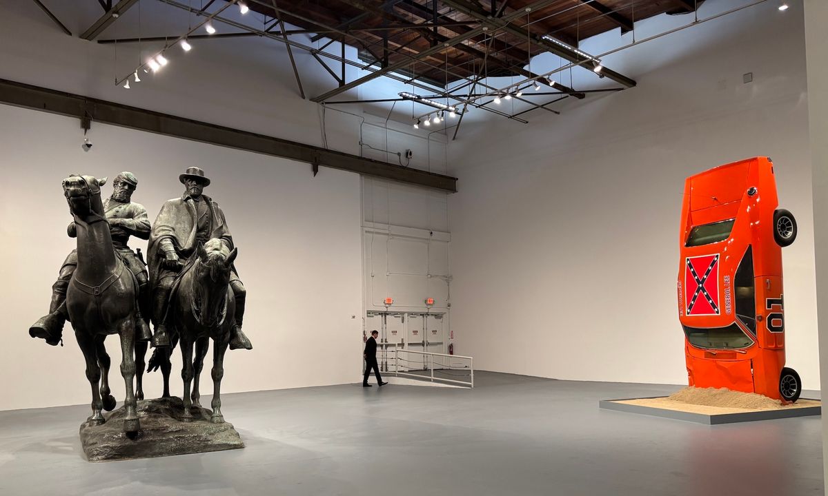 Installation view of Monuments at the Museum of Contemporary Art's Geffen Contemporary space, with Laura Gardin Fraser's Lee-Jackson Monument (1948, left) and Hank Willis Thomas's A Suspension of Hostilities (2019, right) Photo © Jori Finkel