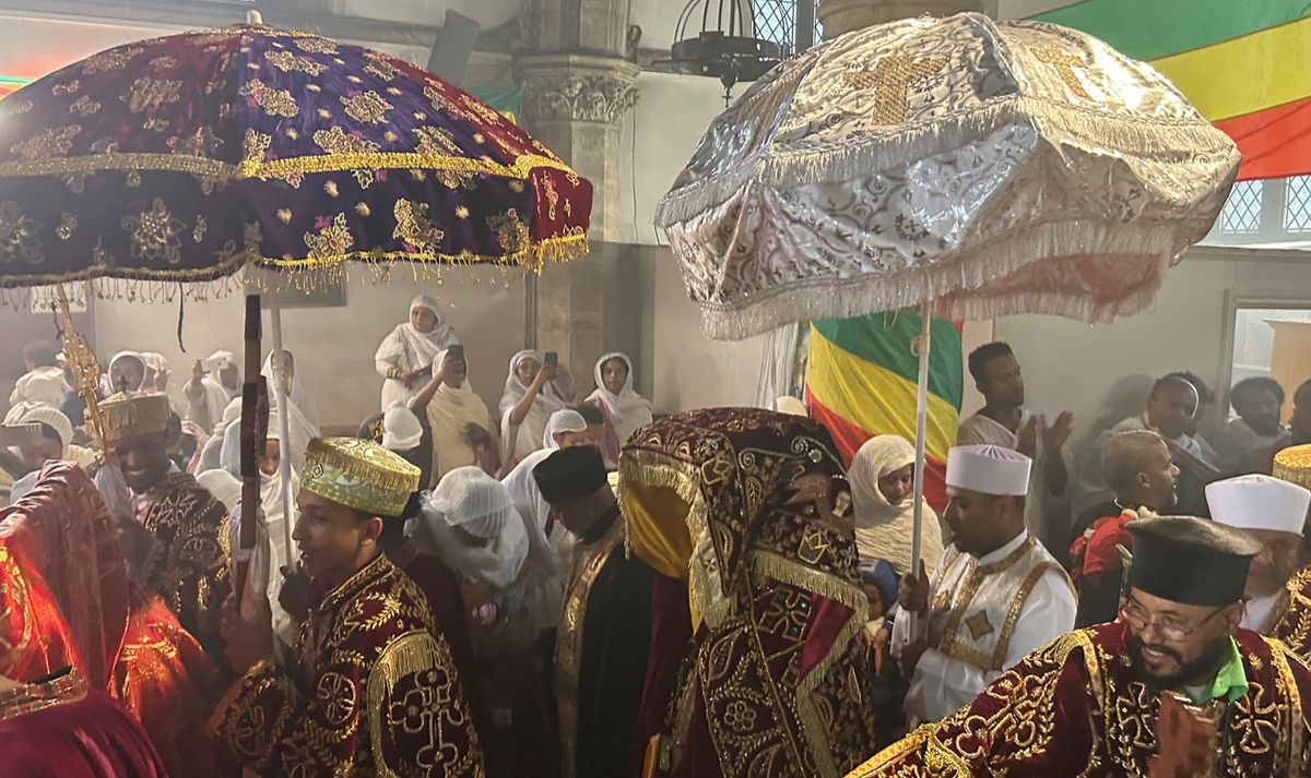 The sacred tabot, covered in an elaborate cloth beneath a silver parasol, is paraded around the church of St Mary of Debre Tsion in Battersea, southwest London Photo: Martin Bailey, The Art Newspaper