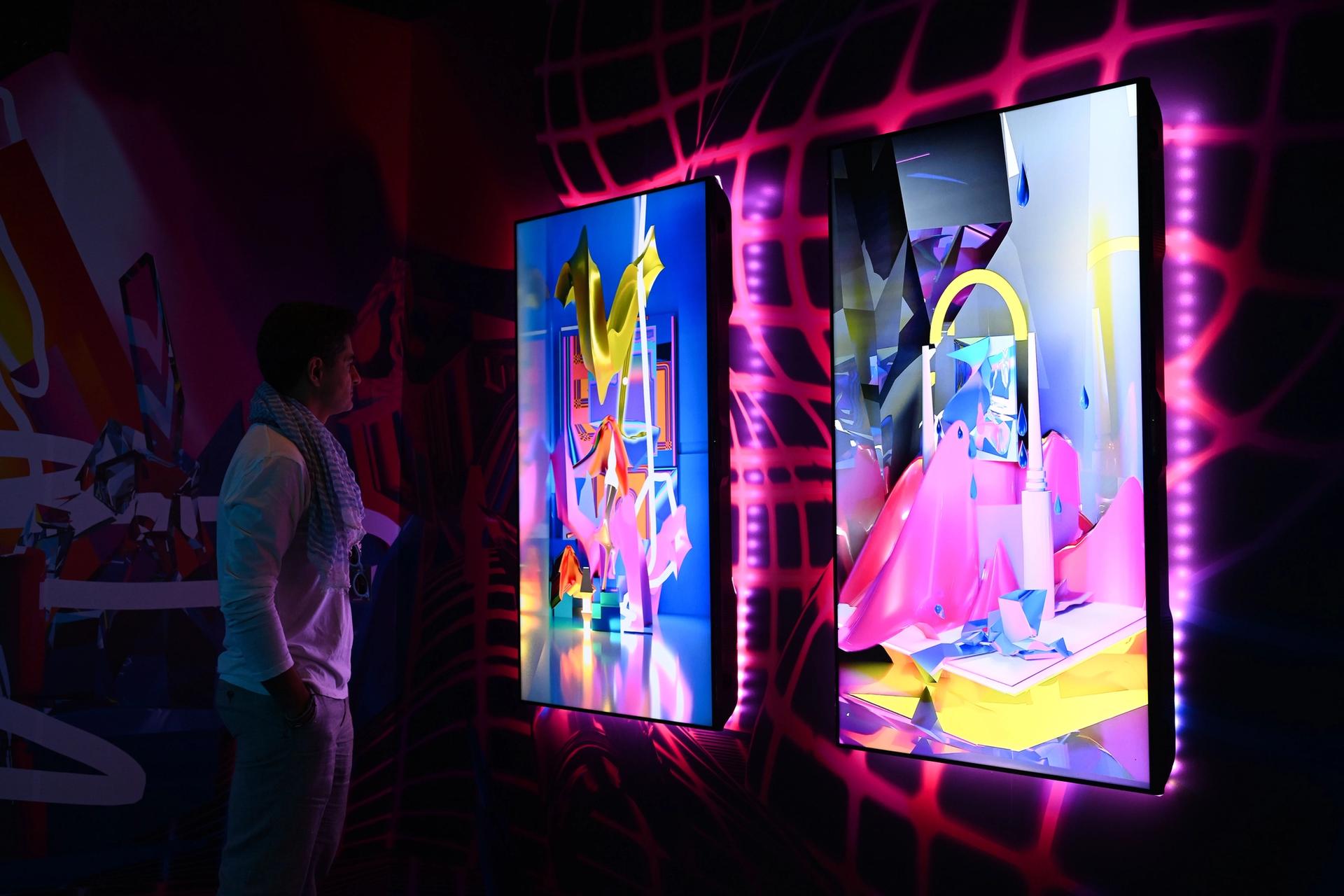 The Art Dubai Digital section is "all dark walls, neon lights, stale air and an unending number of screens in all directions" Photo: Cedric Ribeiro/Getty Images for Art Dubai
