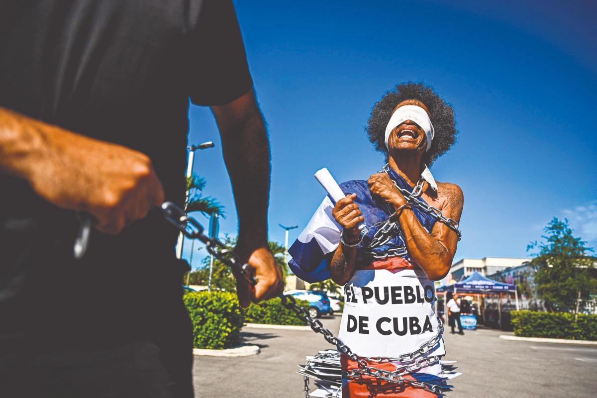 Miami’s Cuban community took to the streets in July to commemorate last year’s historic anti-government protests Photo: Chandan Khanna/AFP via Getty Images