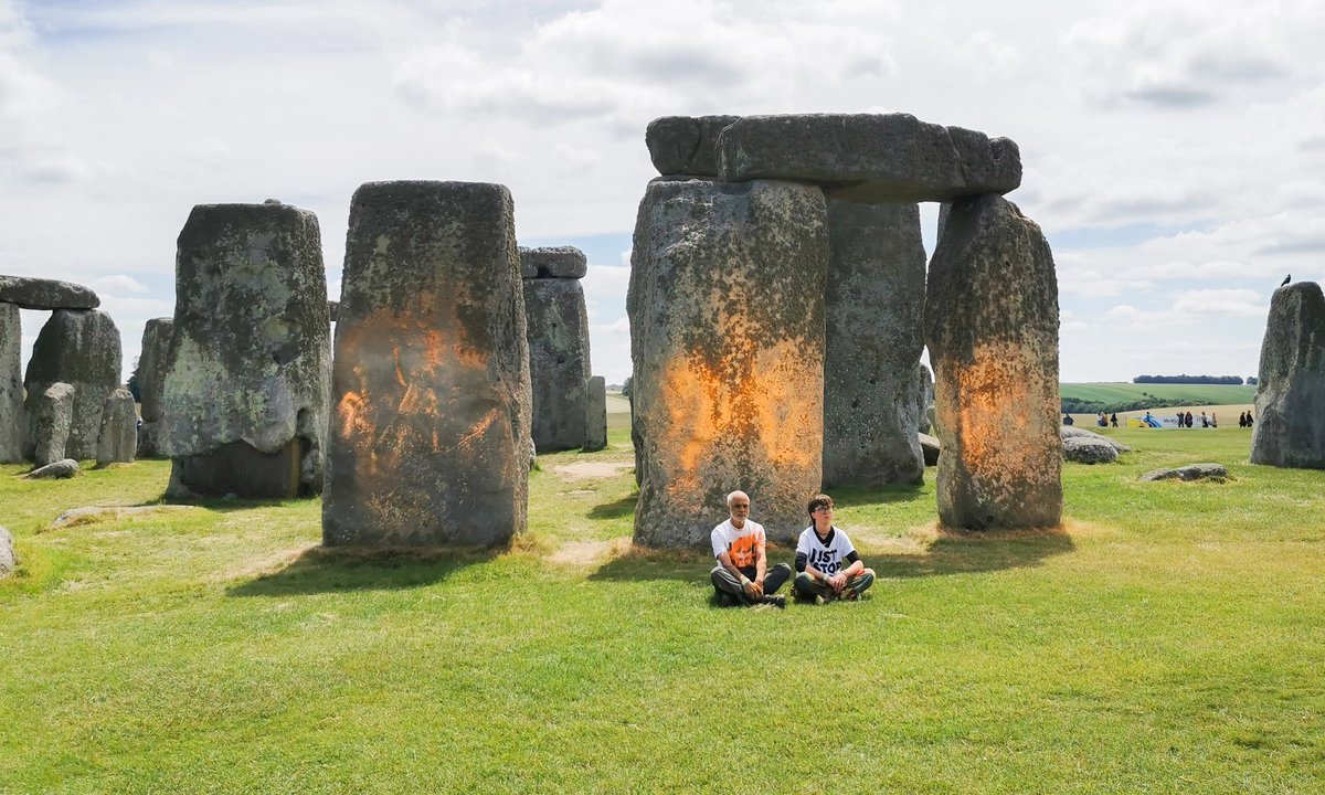 Three climate activists charged following Stonehenge paint protest Three climate activists charged following Stonehenge paint protest