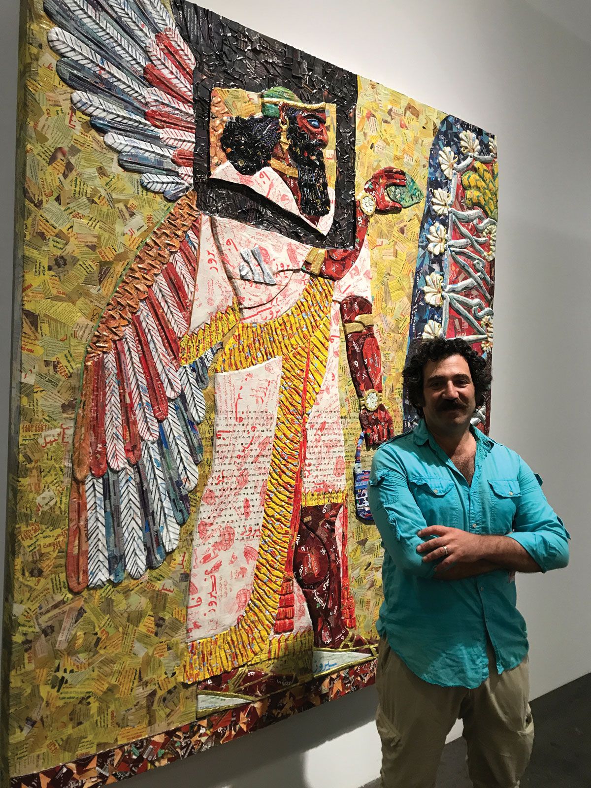 Michael Rakowitz with his work at Art Basel, based on a relief from Nimrud David Owens