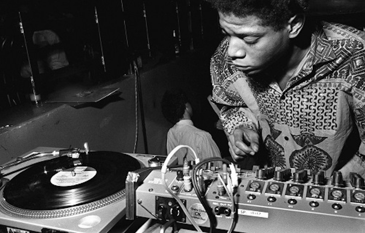 Basquiat DJing for Eric Goode’s birthday party at Area, 1984. Photo Ben Buchanan. © Ben Buchanan