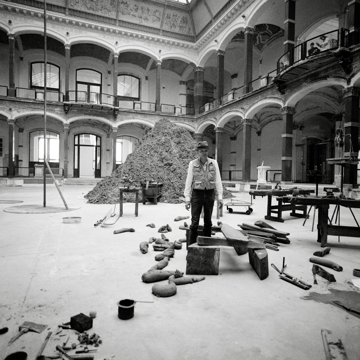 Joseph Beuys in front of Stag Monuments in the Zeitgeist exhibition at the Martin-Gropius-Bau, Berlin in 1982 Jochen Littkemann. Courtesy of Galerie Thaddaeus Ropac London · Paris · Salzburg