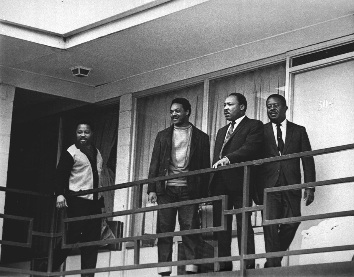 The Reverend Martin Luther King Jr stands with other civil rights leaders on the balcony of the Lorraine Motel in Memphis, Tennessee on 3 April 1968, the day before he was assassinated AP Photo/Charles Kelly