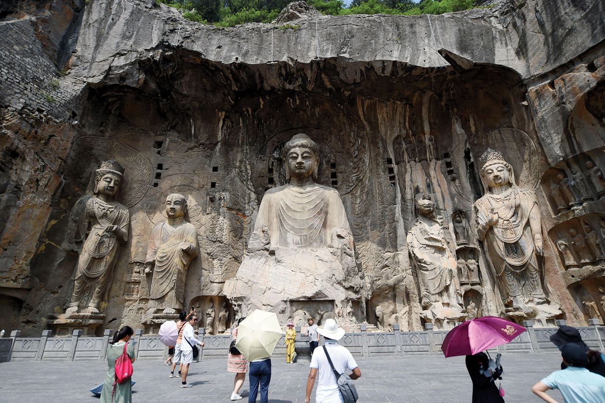 The 1,500-year-old Longmen Grottoes, a Unesco World Heritage site, are located beside a river that burst its banks Alvise Armellini/DPA/Alamy