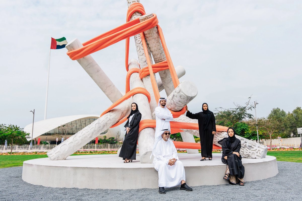 The Union of Artists outside the Etihad Museum in Dubai, with the artists, from left to right: Shaikha Al Mazrou, Khalid Al Banna, Mohamed Ahmed Ibrahim (sitting), Asma Belhamar and Afra Al Dhaheri
Courtesy Dubai Culture