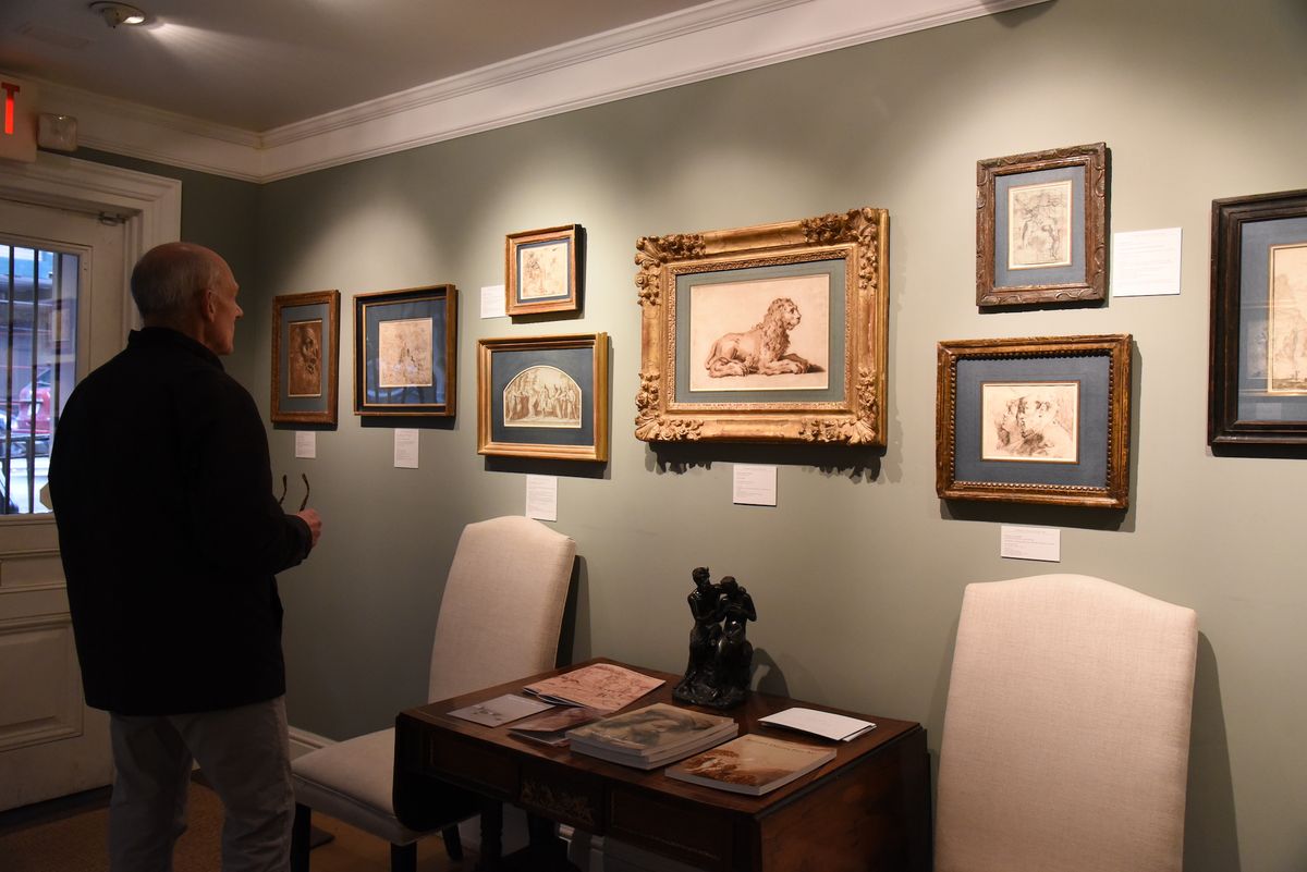 A visitor at Stephen Ongpin Fine Art during Master Drawings New York 2023 Courtesy of Caroline Ourso