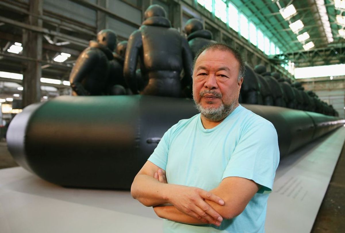 Ai Weiwei in front of his work Law of the Journey (2017) at the 21st Biennale of Sydney Don Arnold/WireImage
