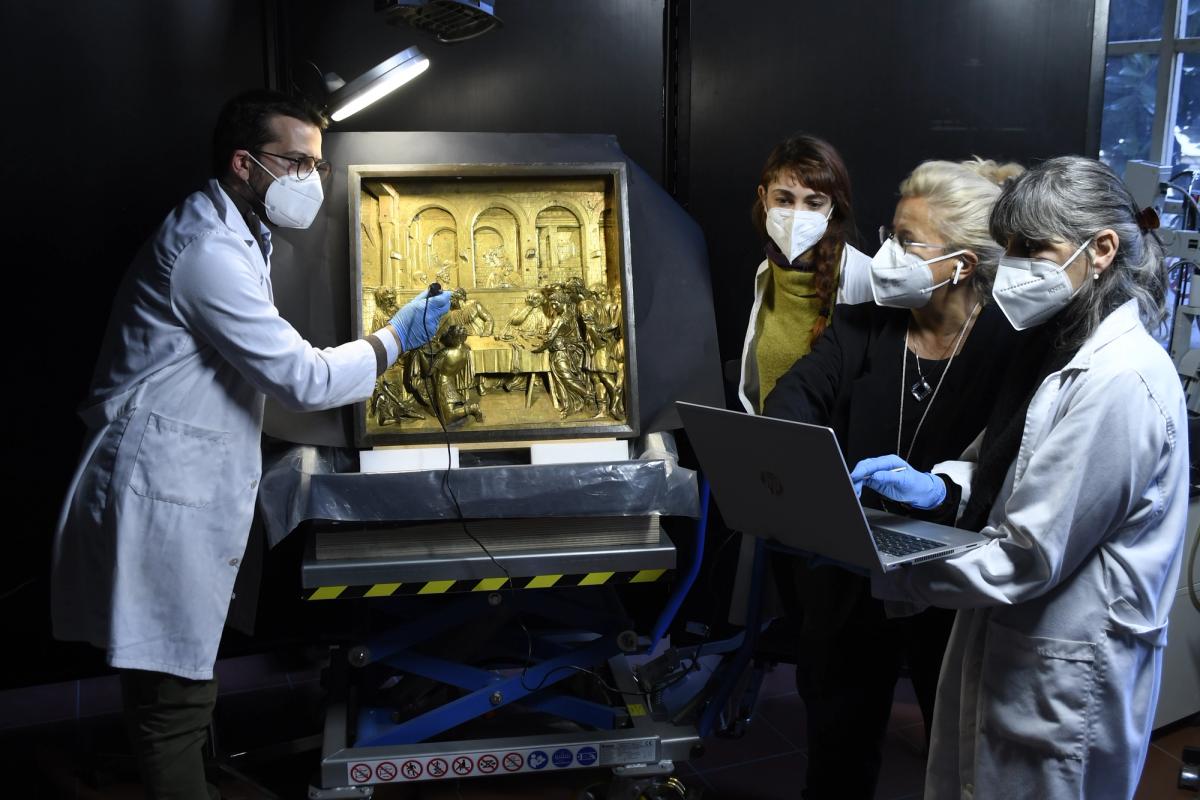 The team working on the restoration of Donatello's Feast of Herod Photo: OPD