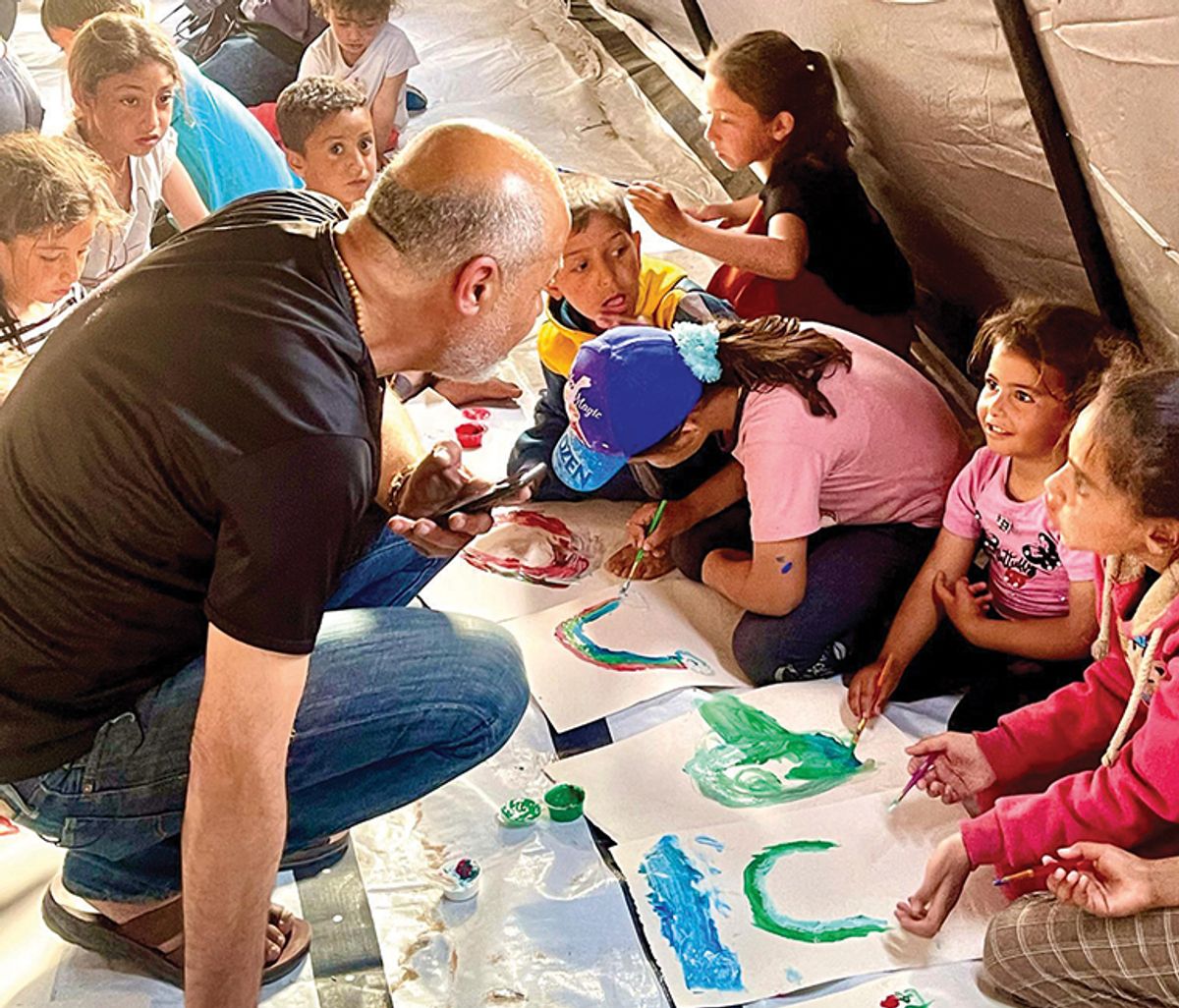Basel El Maqosui, photographer, teacher and co-founder of Shababeek cultural space, now works with refugee children in Rafah Basel El Maqosui