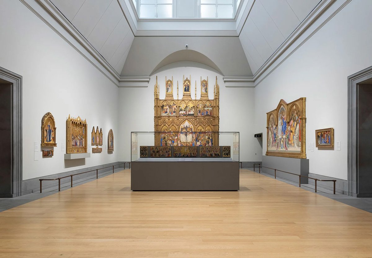The reconstructed San Pier Maggiore Altarpiece by Jacopo di Cione is mounted on a plinth at one end of the main "nave" of the Sainsbury Wing galleries. In front of it, Fra Angelico’s altar panels from San Domenico, Fiesole, are presented lower than before to emphasise their predella function
Photograph: The National Gallery