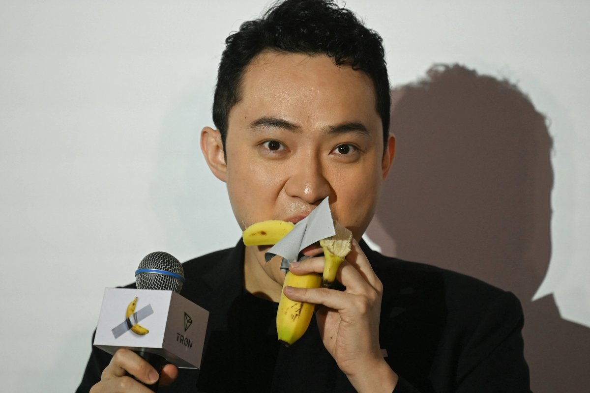 Sun took two bites out of the world's most expensive banana at a press conference in Hong Kong
Photo by PETER PARKS/AFP via Getty Images