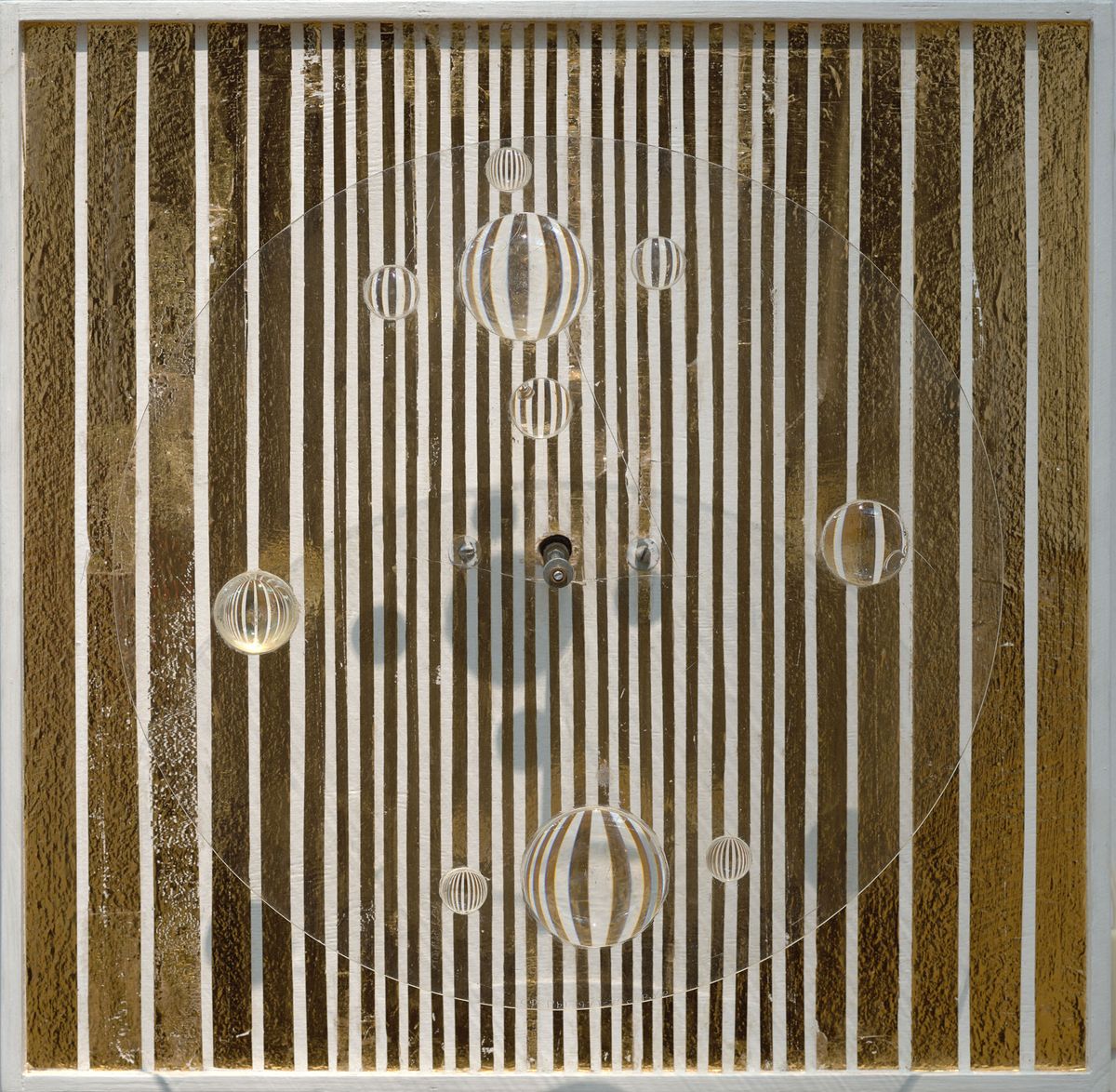 A 1972 work by Viacheslav Koleichuk made using plywood, plexiglass, lenses and a small motor