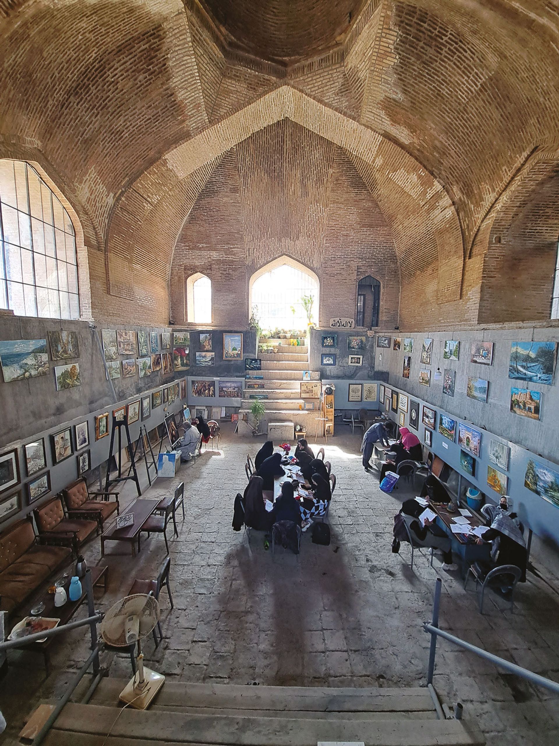 The Malek Cistern in Herat provides an inspiring location for Mohammad Ebrahim Habibi’s art classes. He has yet to receive objections to running classes for women Photo: Sarvy Geranpayeh