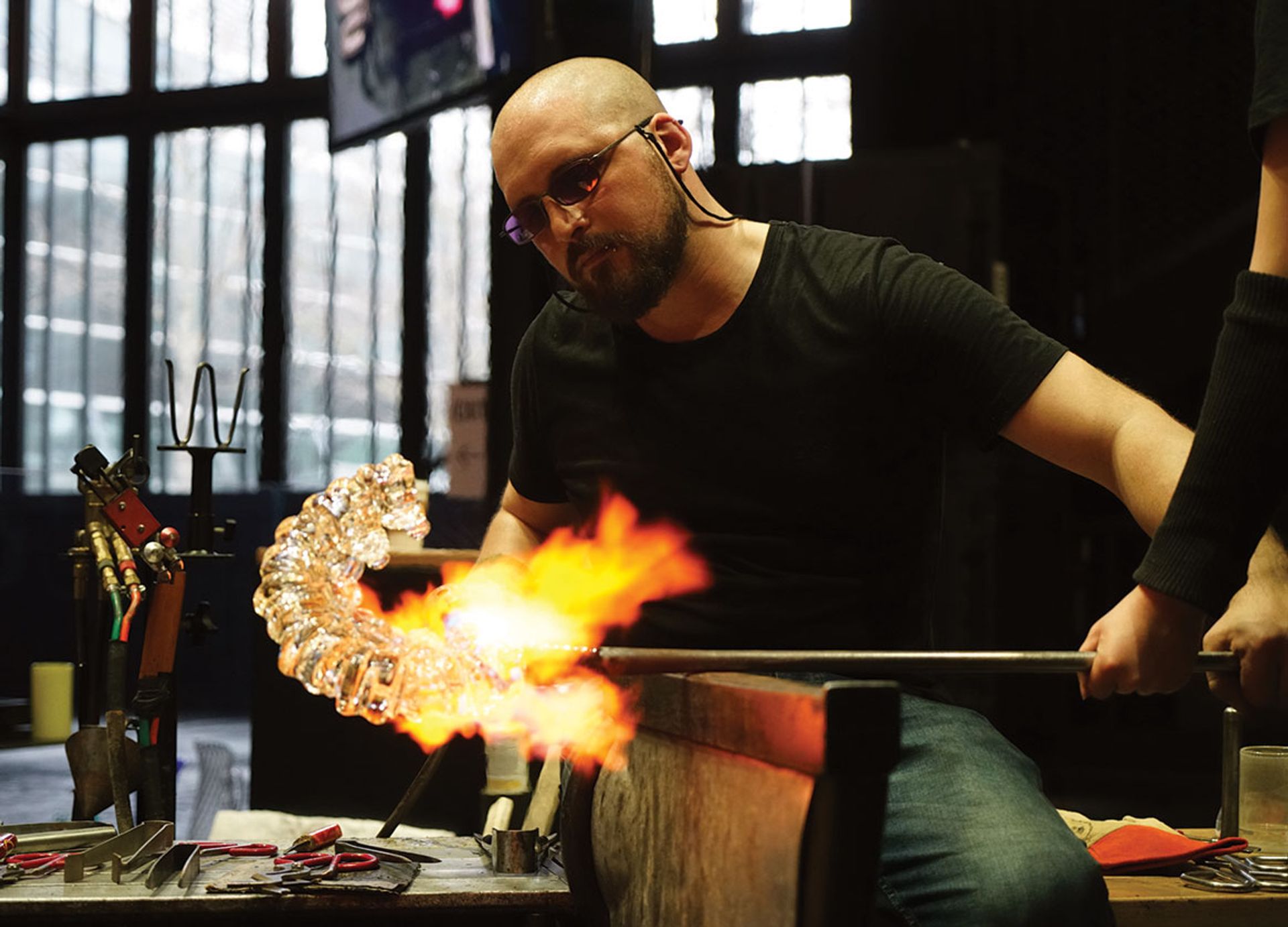 Elliot Walker, who won the second series of the Netflix series Blown Away, works on a creation at the Corning Museum Courtesy of Corning Museum of Glass